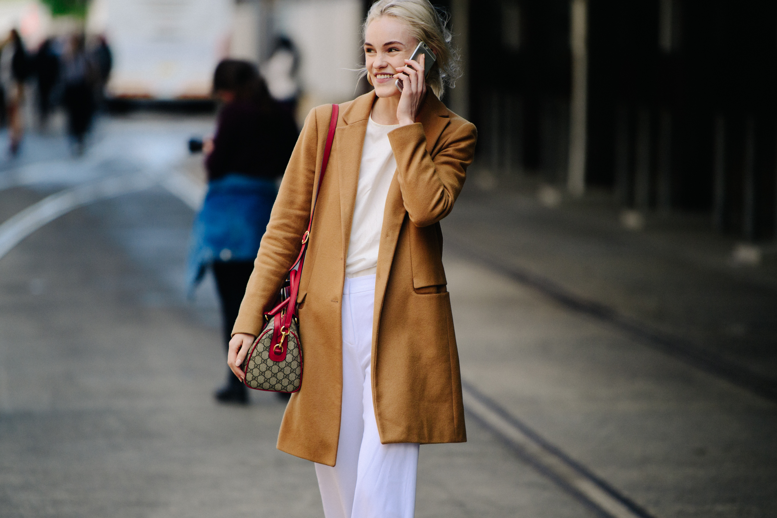 Woman wearing camel coat