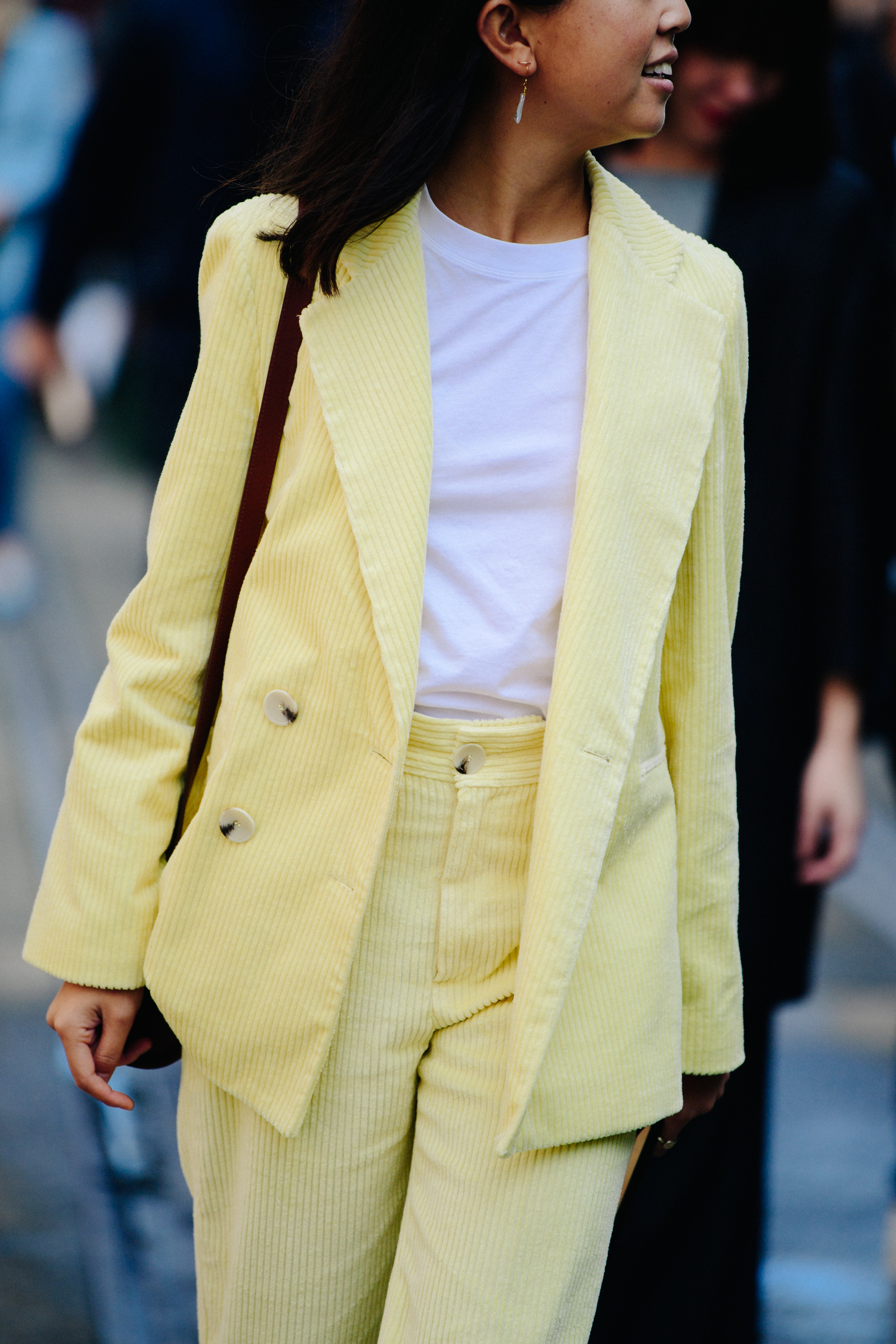 Woman wearing yellow jacket