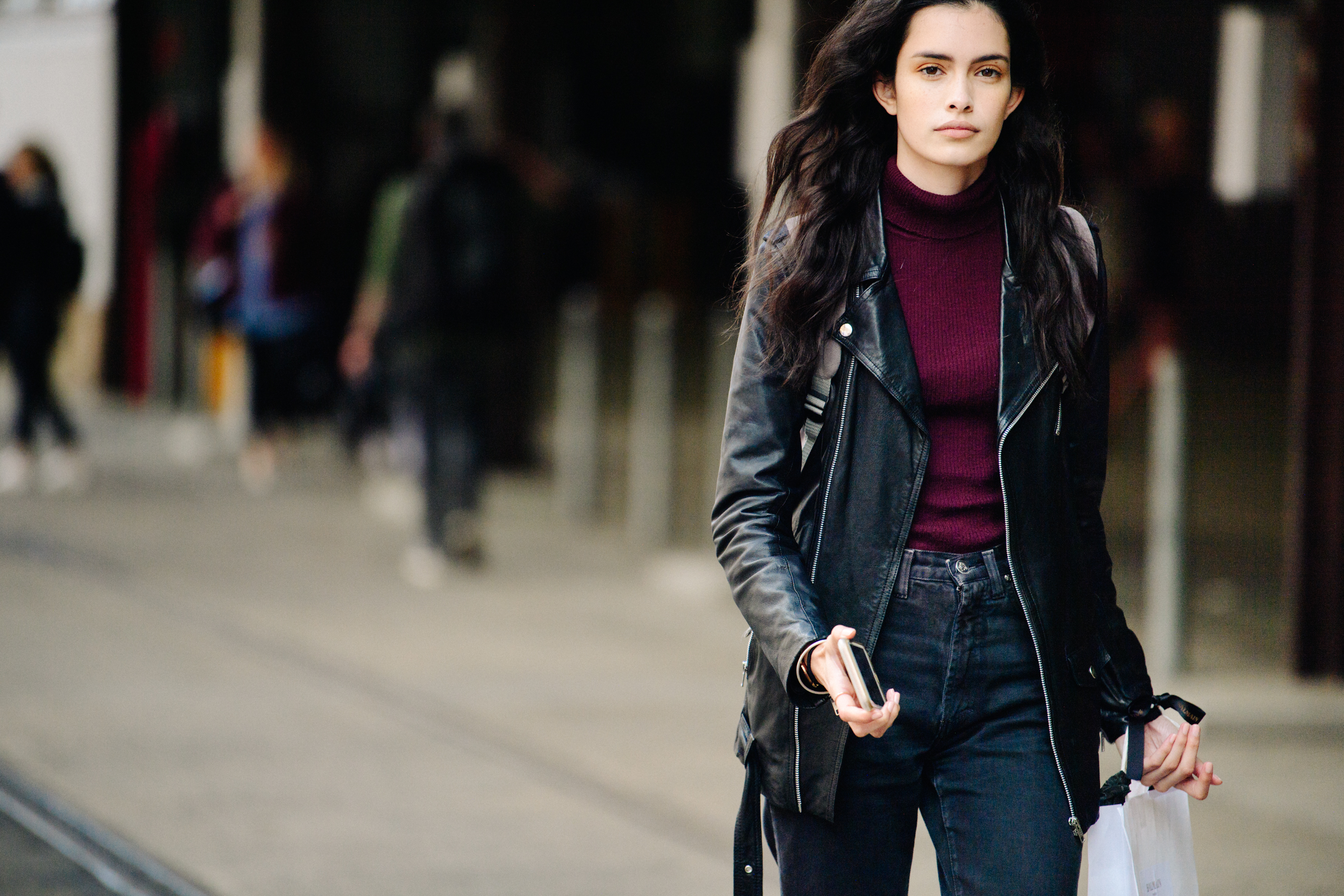 Model wearing black leather jacket