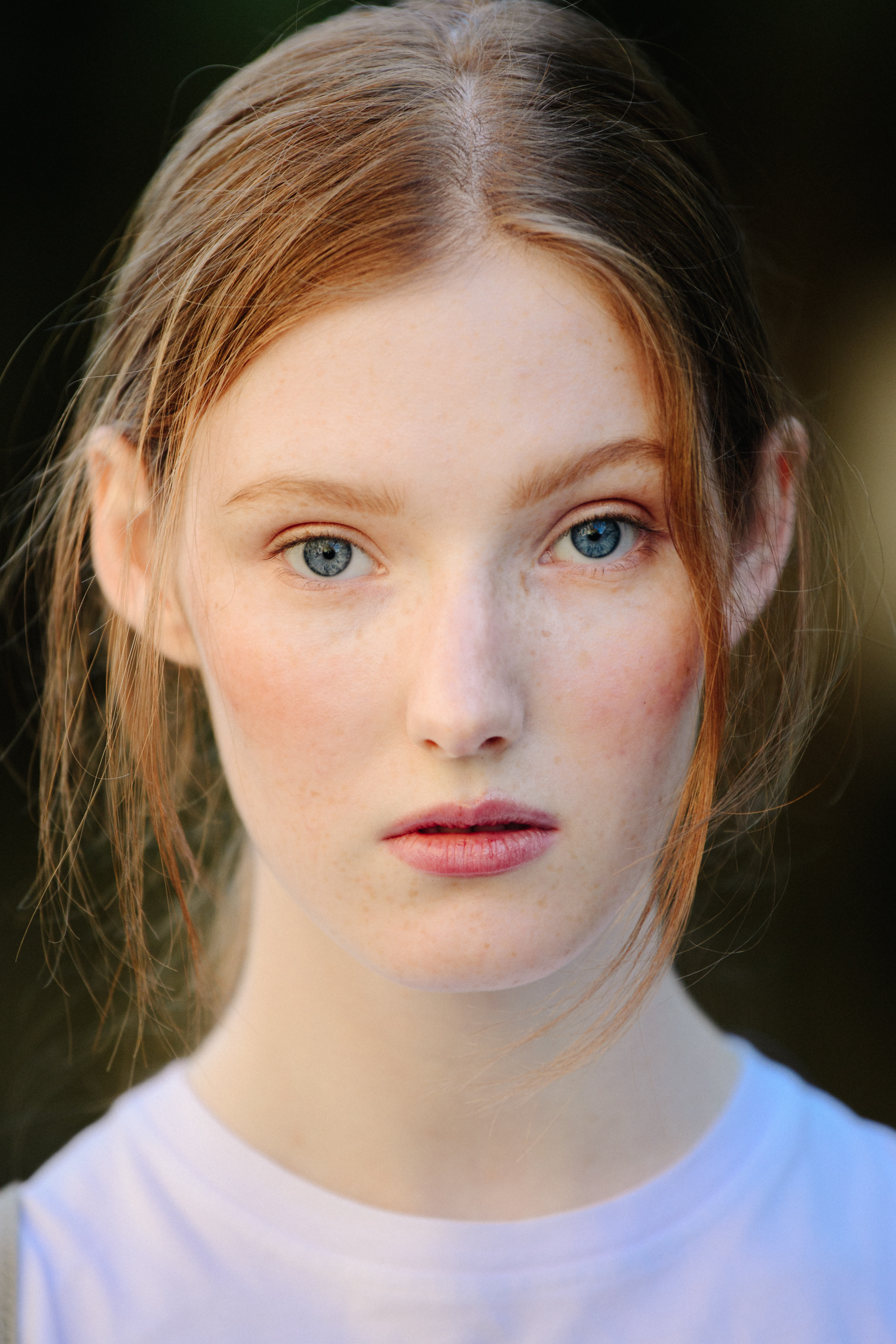 Portrait of model with long ginger hair