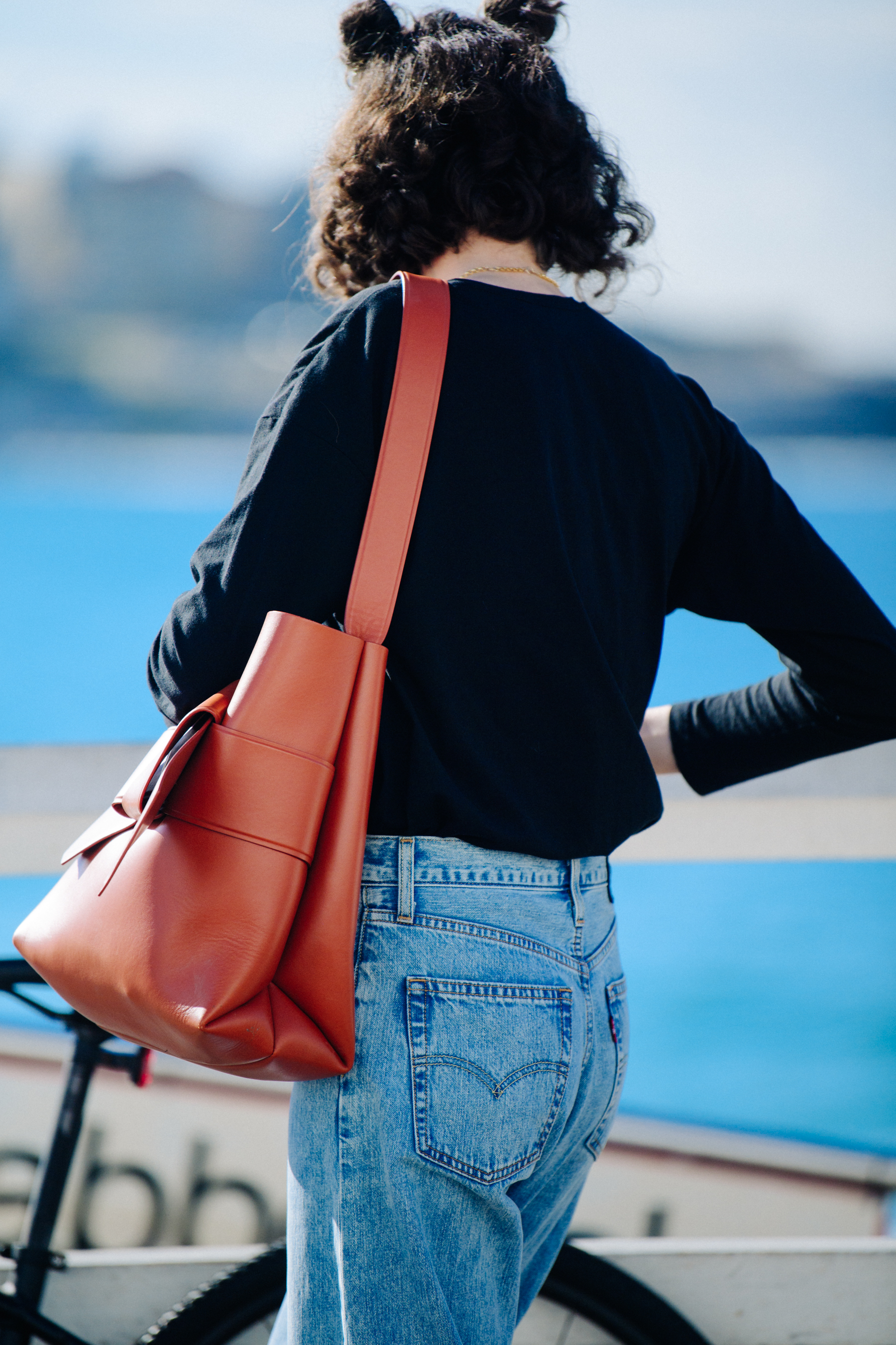 Woman wearing blue denim jeans