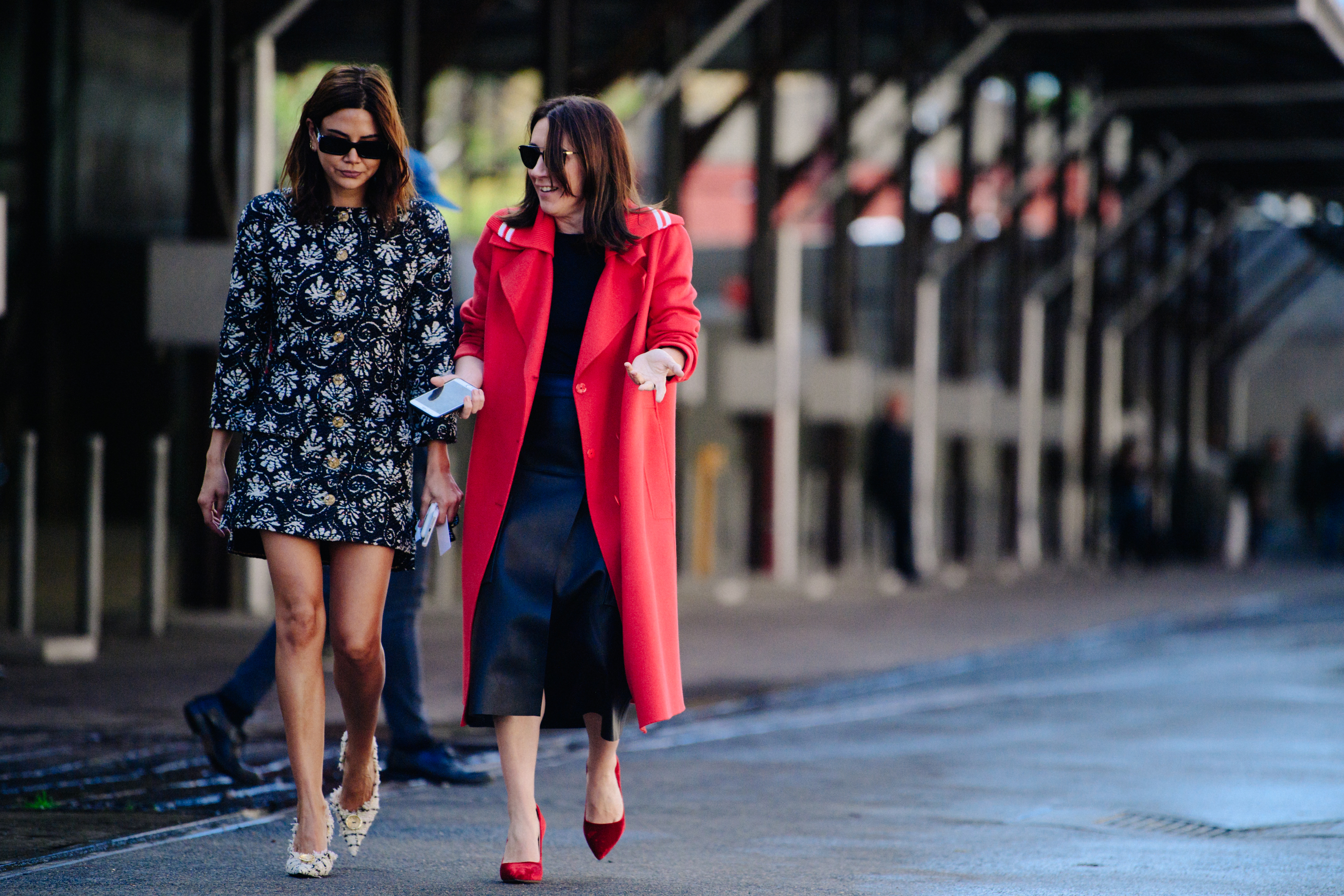 Two women wearing heels