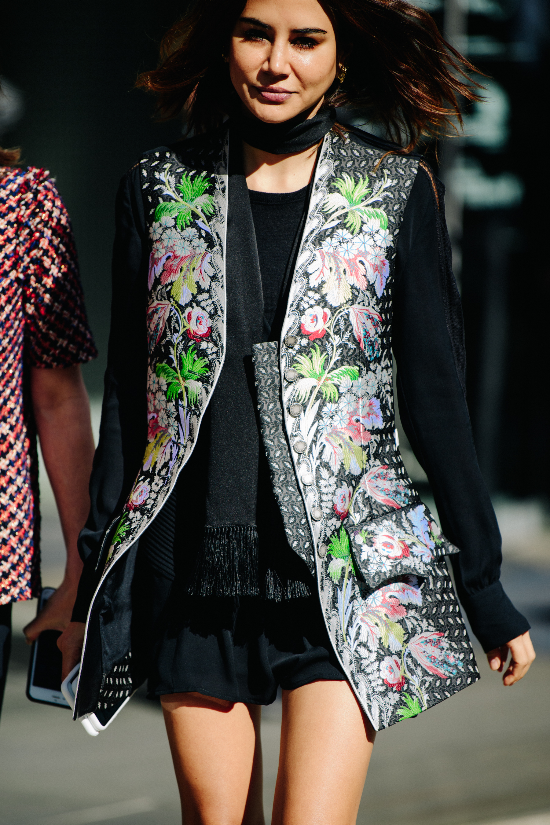 Woman wearing floral coat