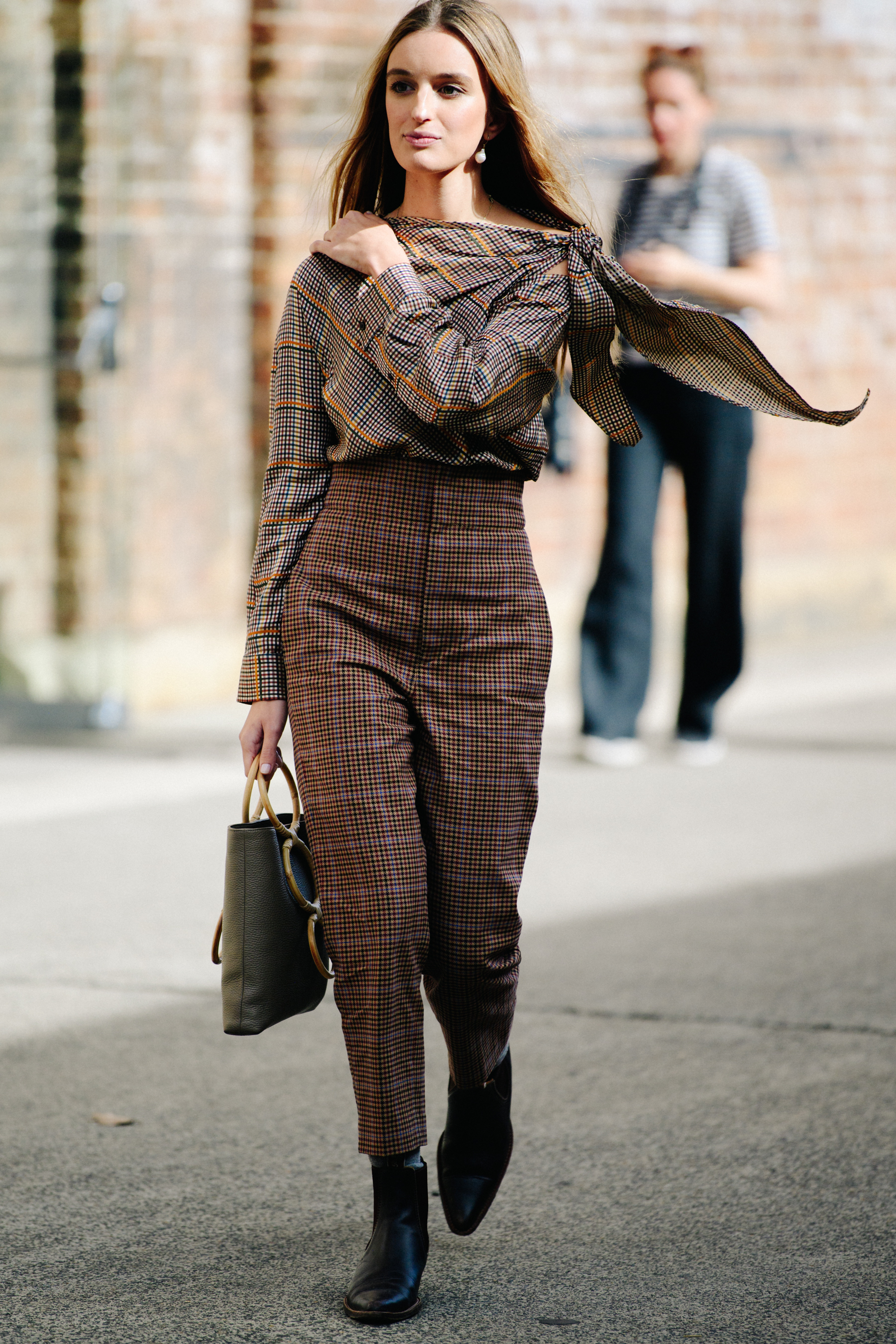 Woman wearing check suit