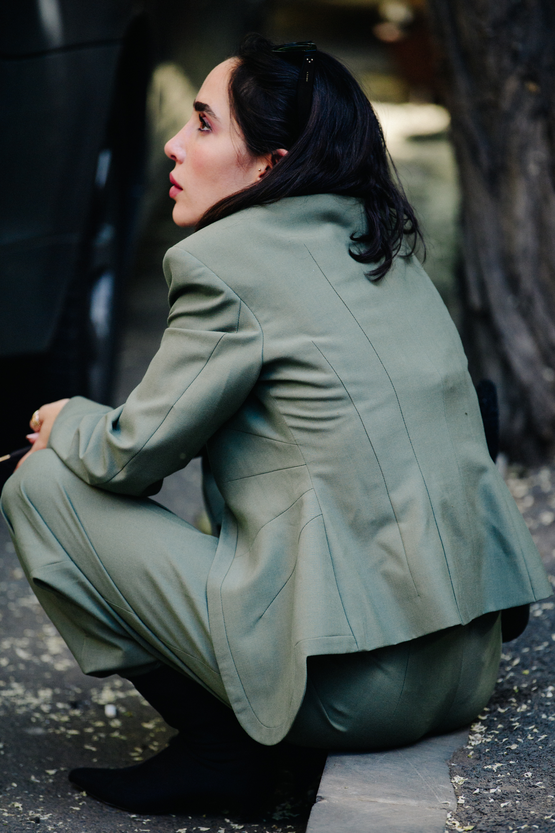 Woman wearing green suit