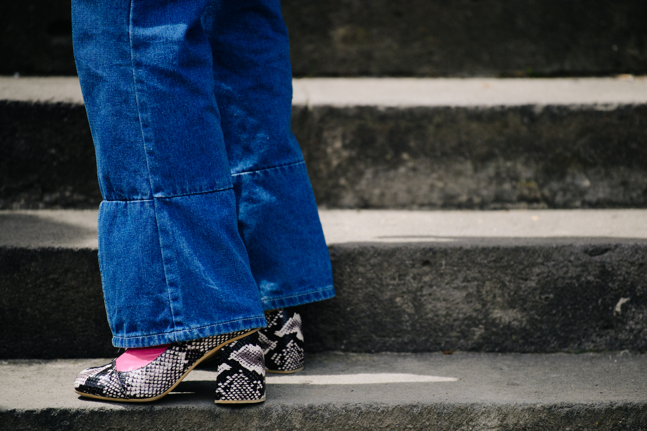 Woman wearing wide denim jeans