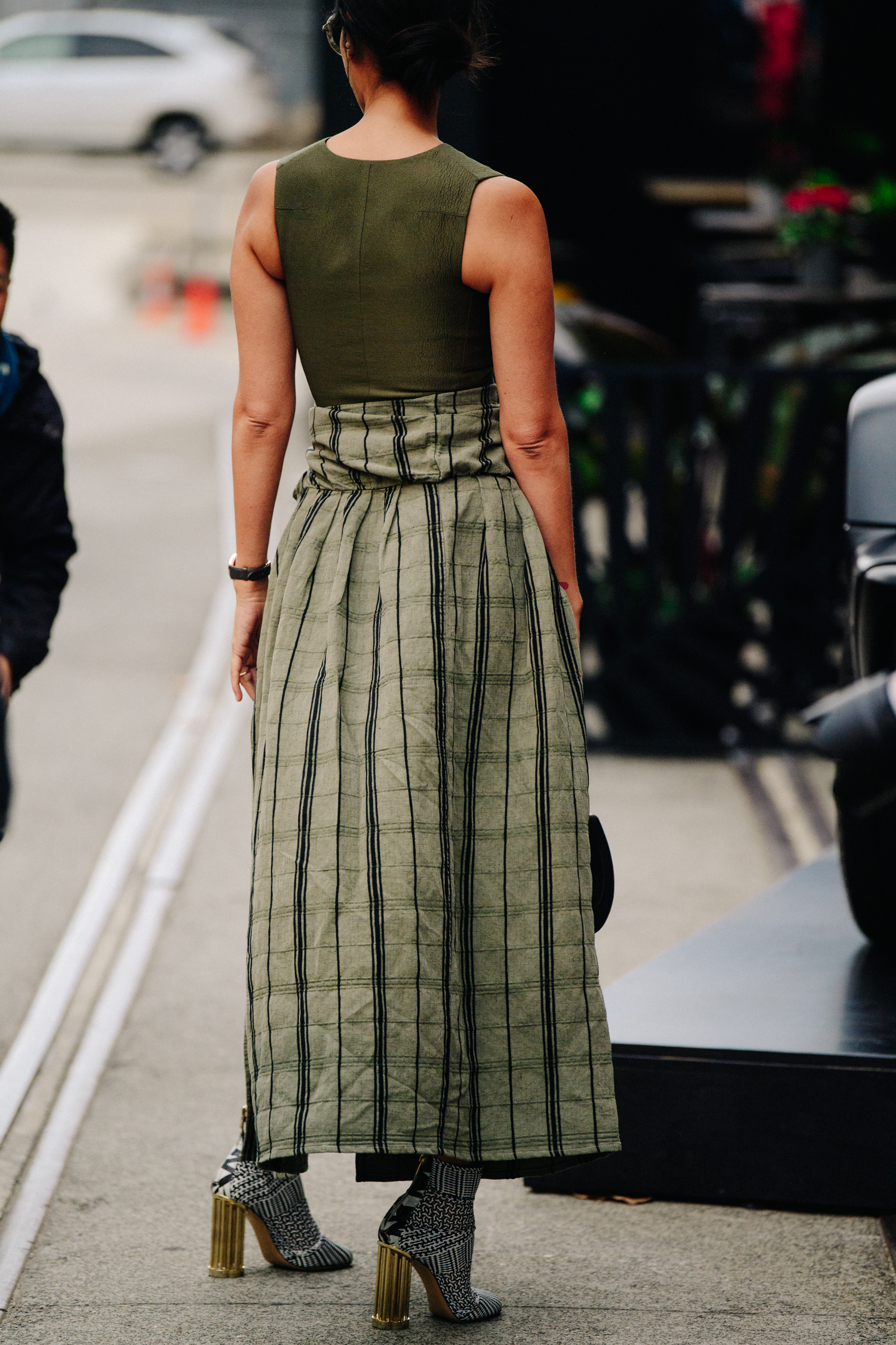 Woman wearing green outfit