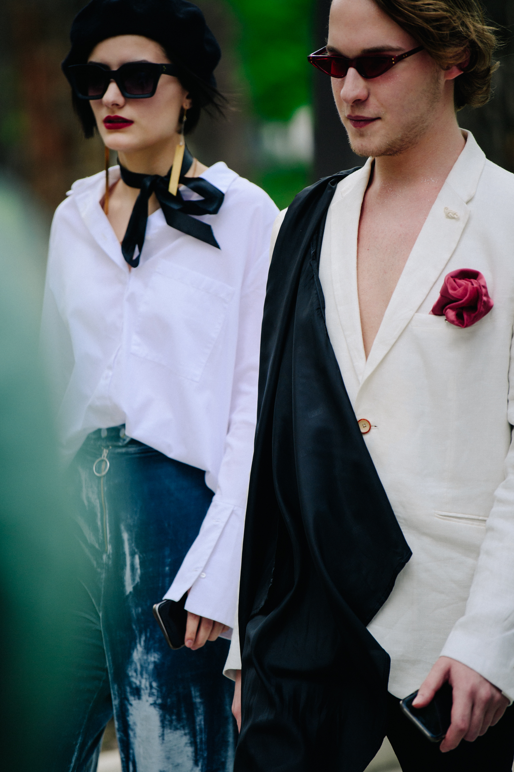 Couple wearing white and black outfits