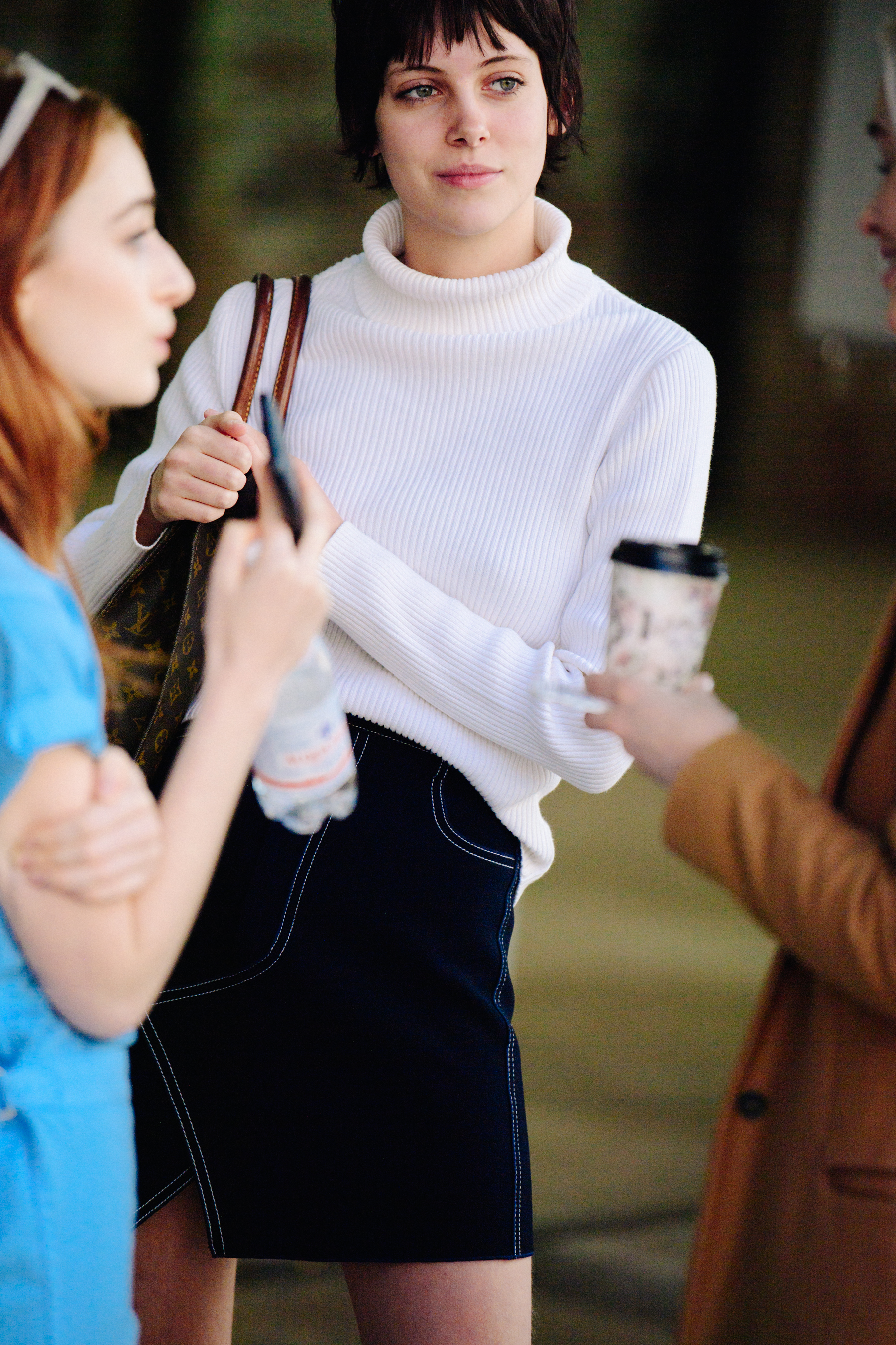 Australian model wearing white jumper