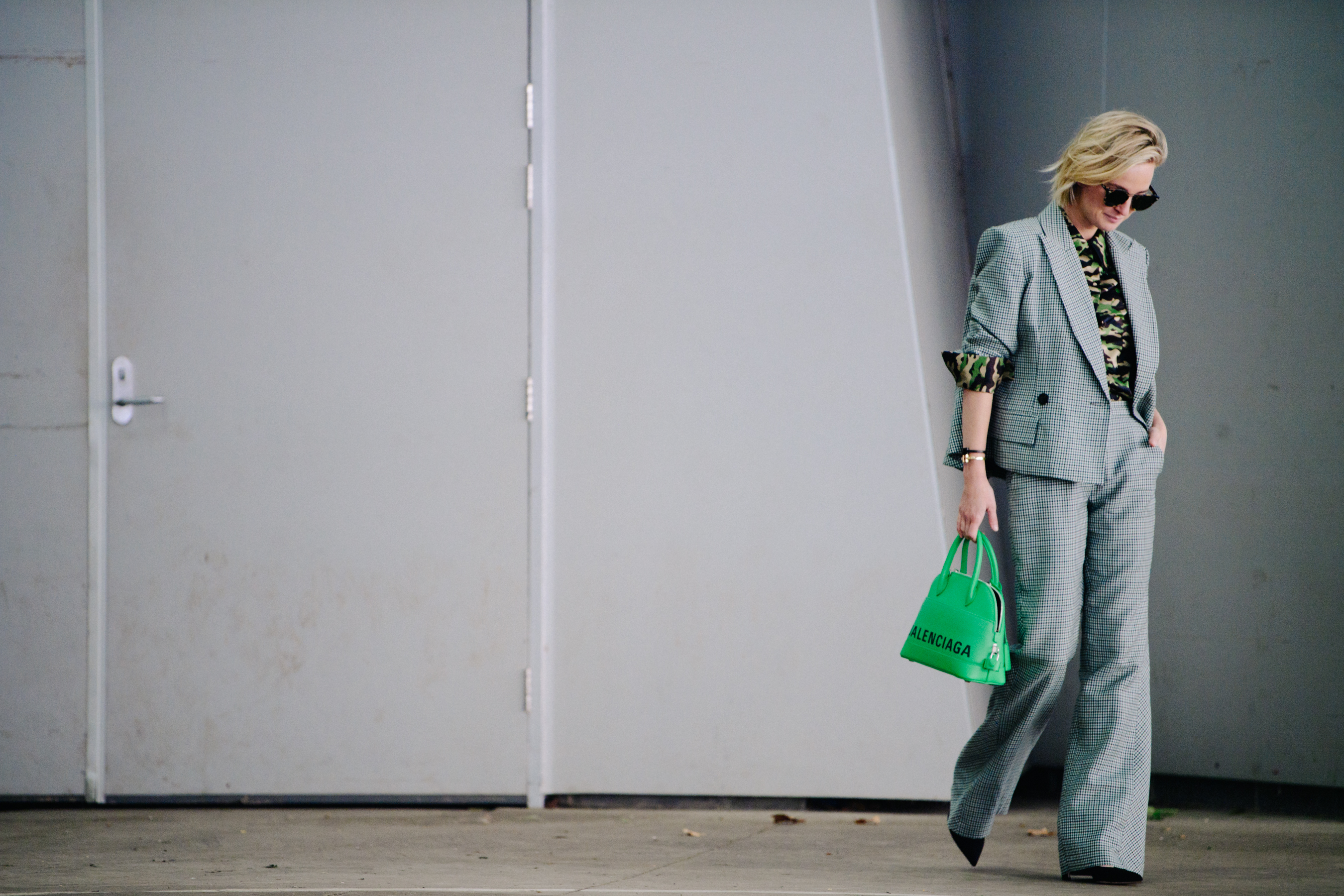 Woman wearing check suit