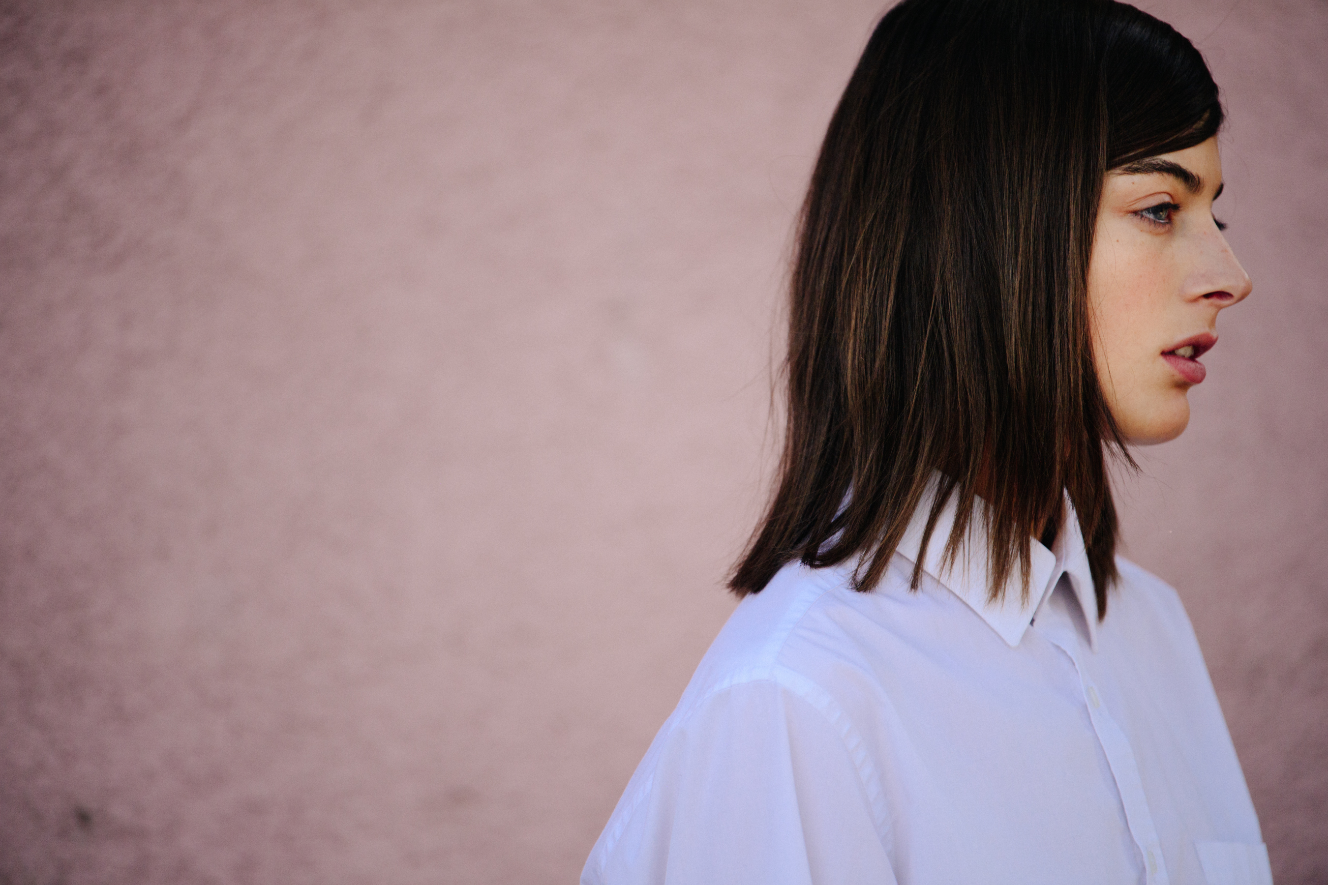 Model wearing white shirt