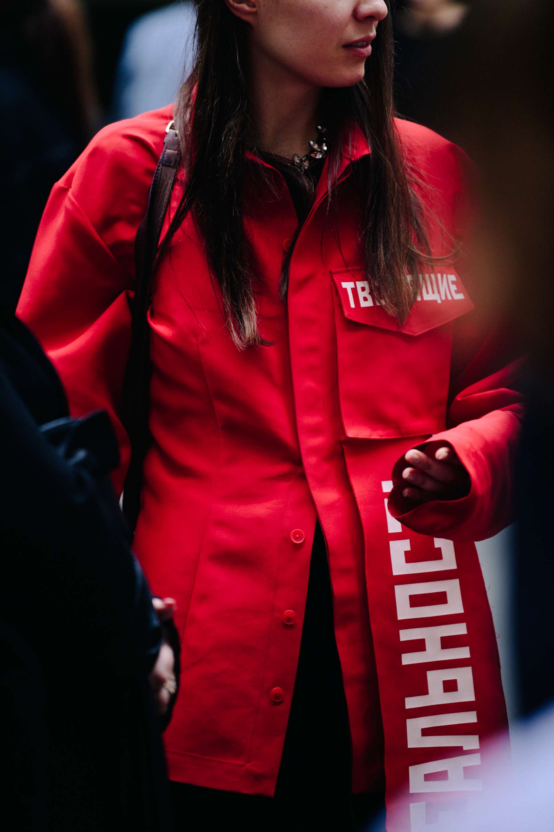 Woman wearing red jacket