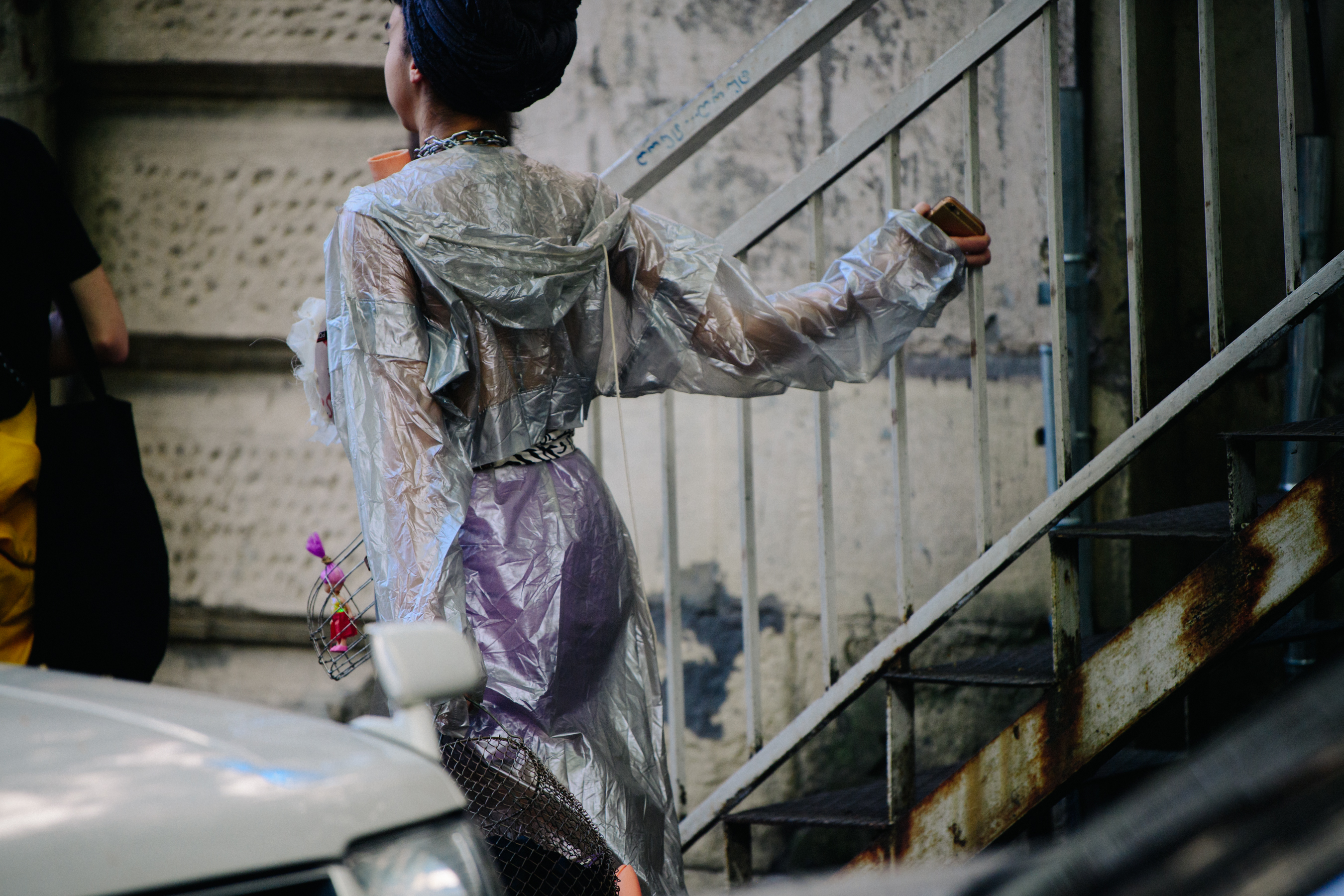 Woman wearing silver coat