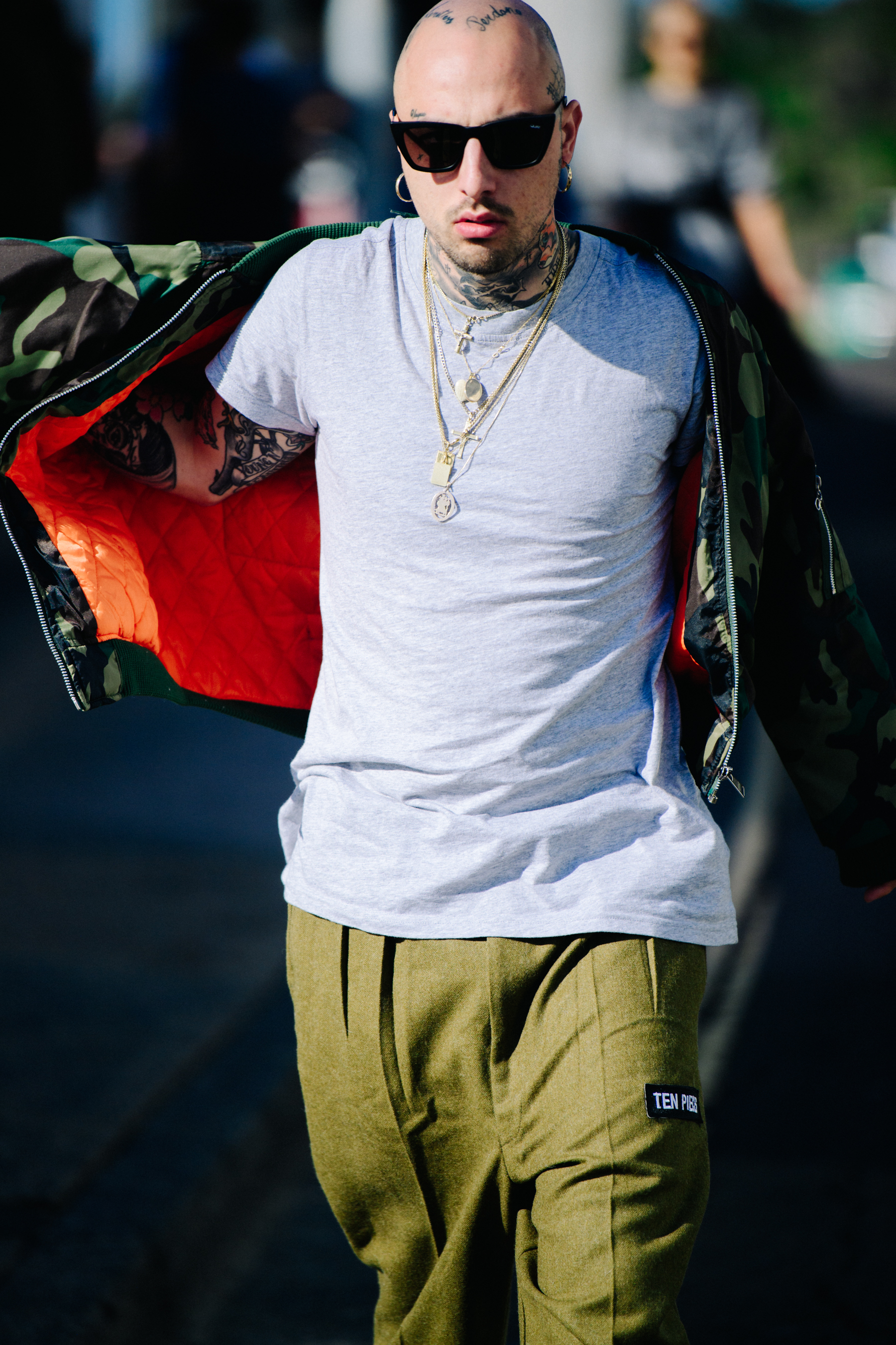 Man wearing grey tee shirt