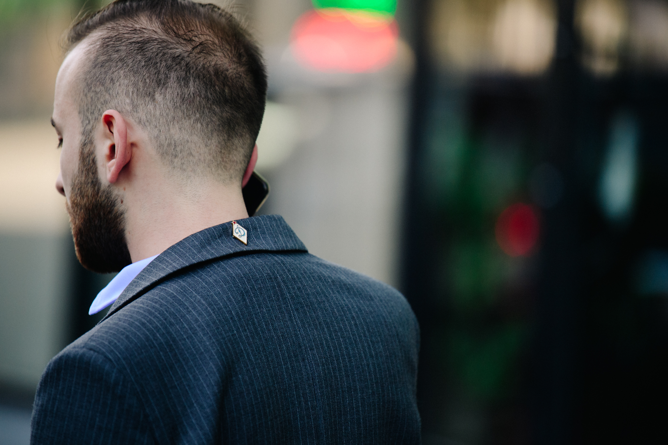 Man wearing grey suit jacket