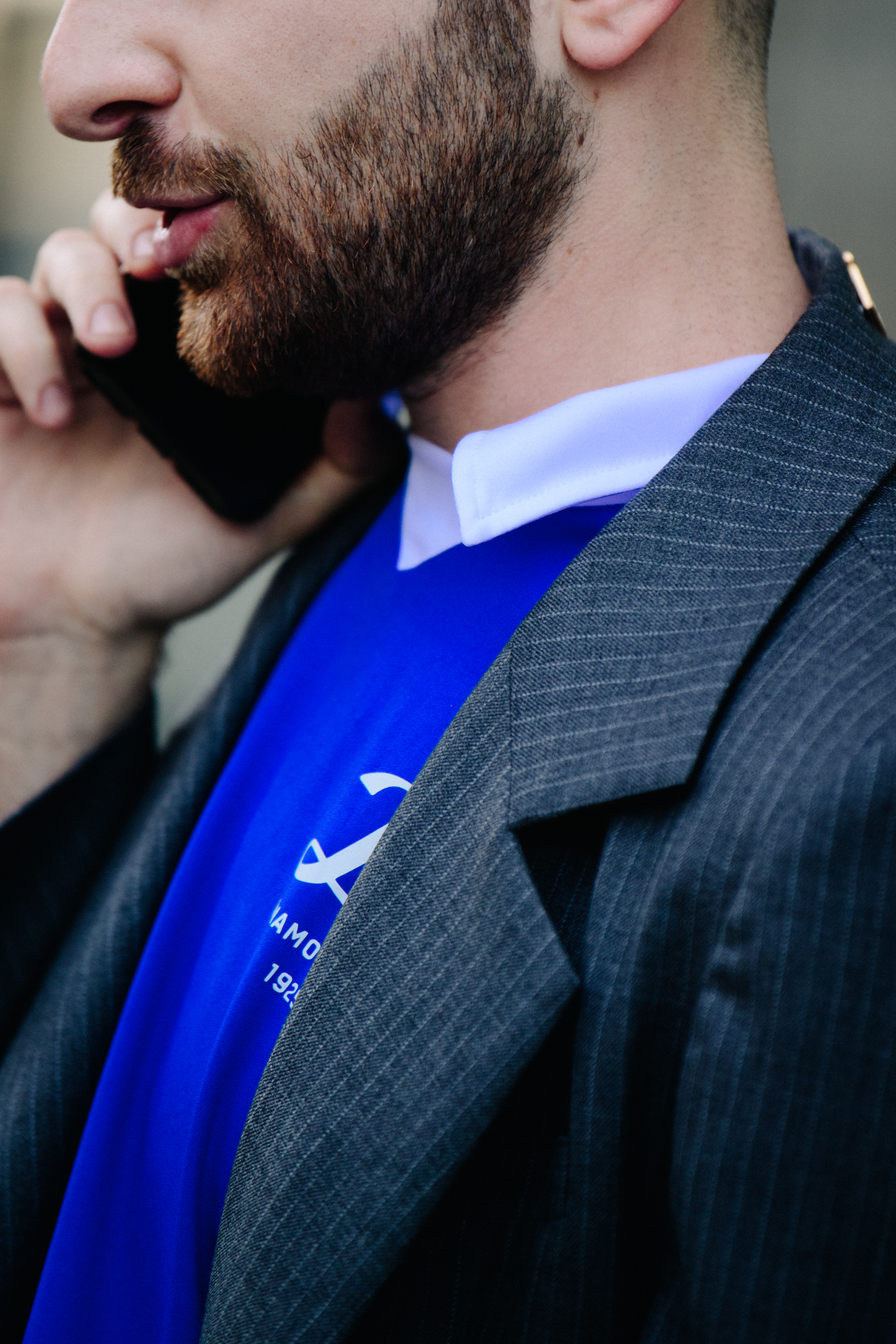Man wearing grey suit jacket