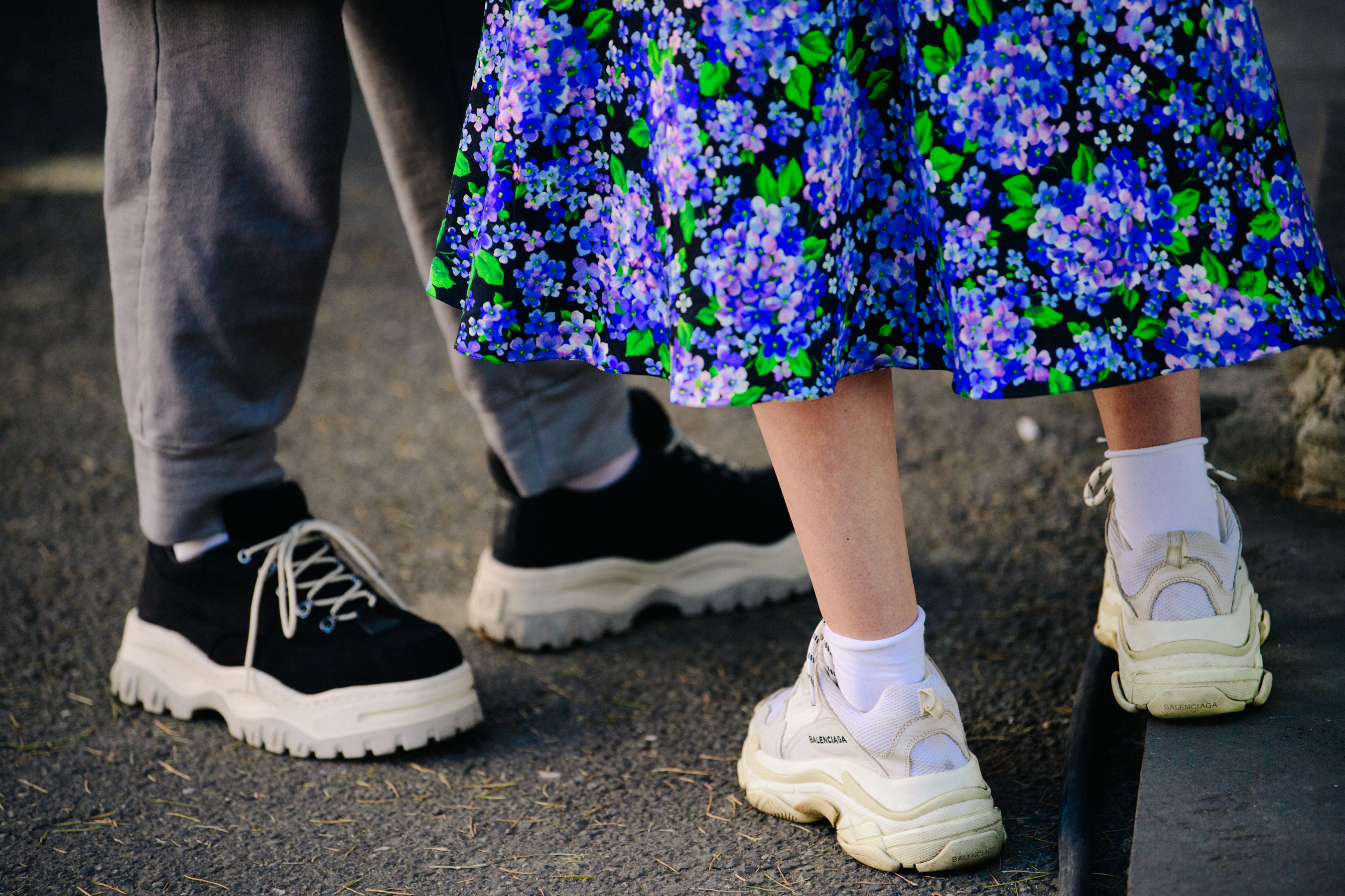 Couple wearing chunky sneakers