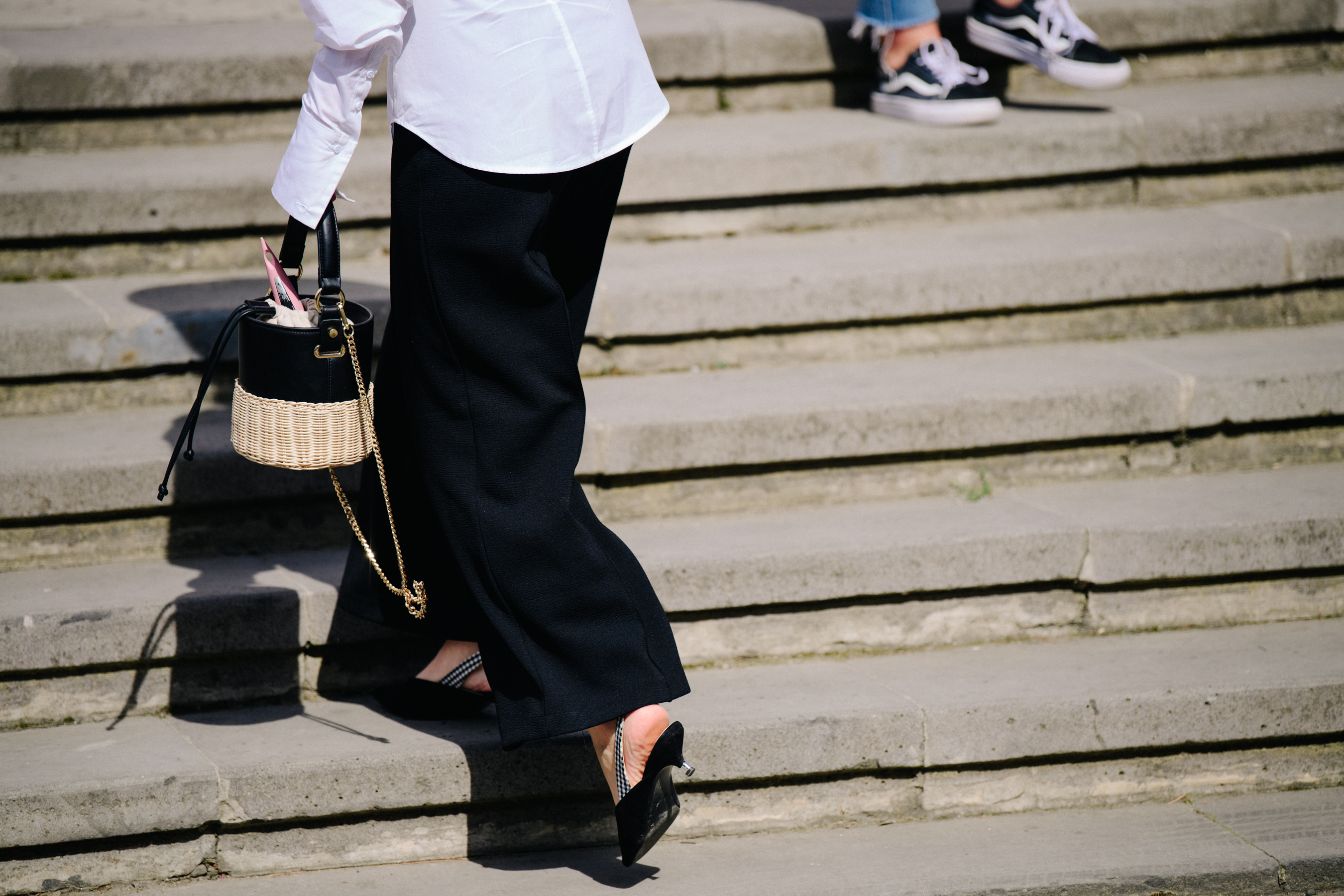 Woman wearing long black skirt