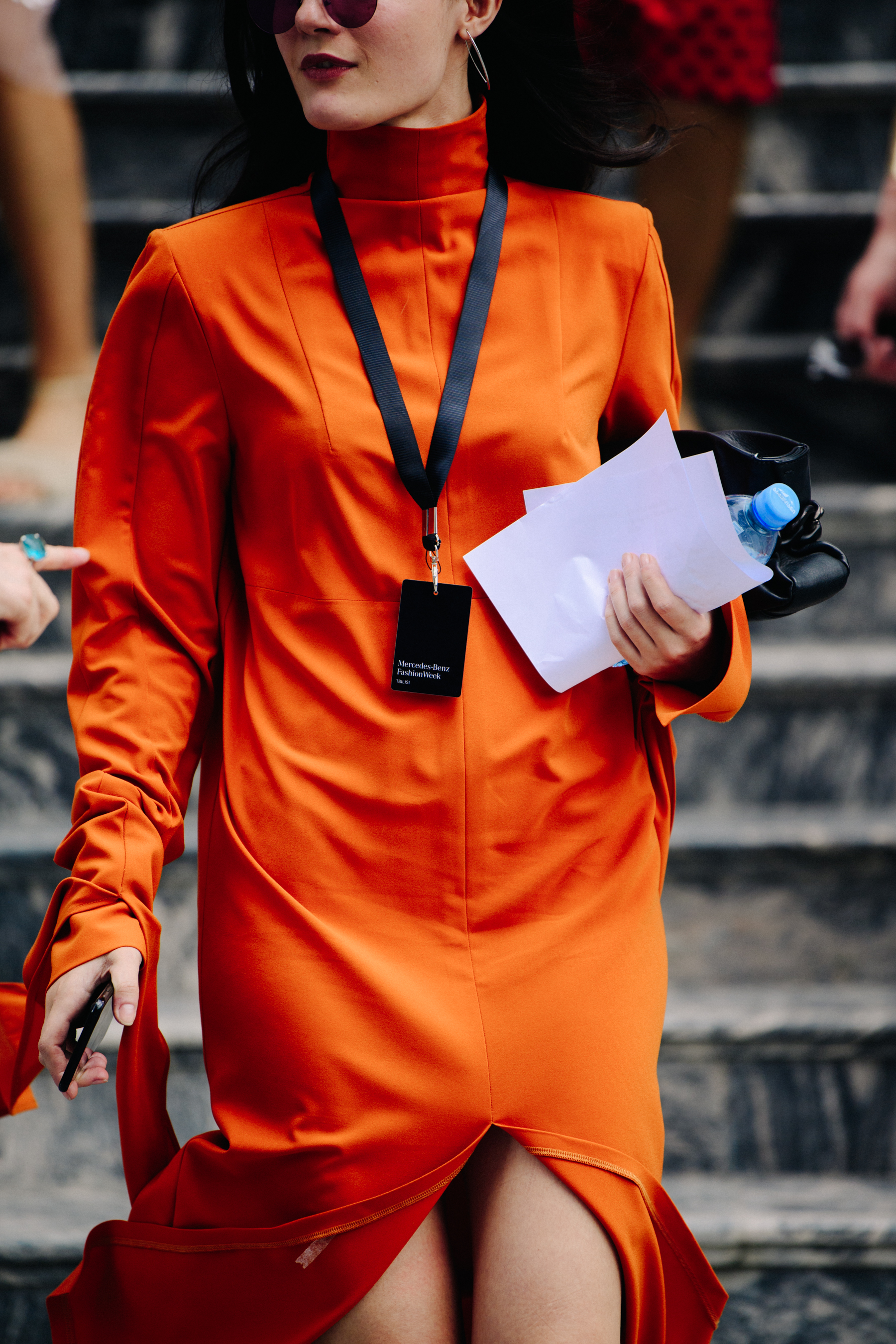 Woman wearing orange outfit