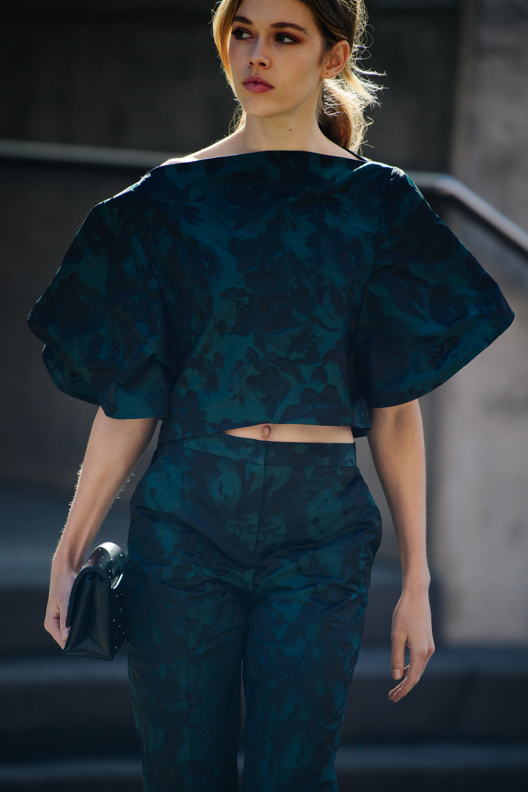 Woman wearing blue floral outfit