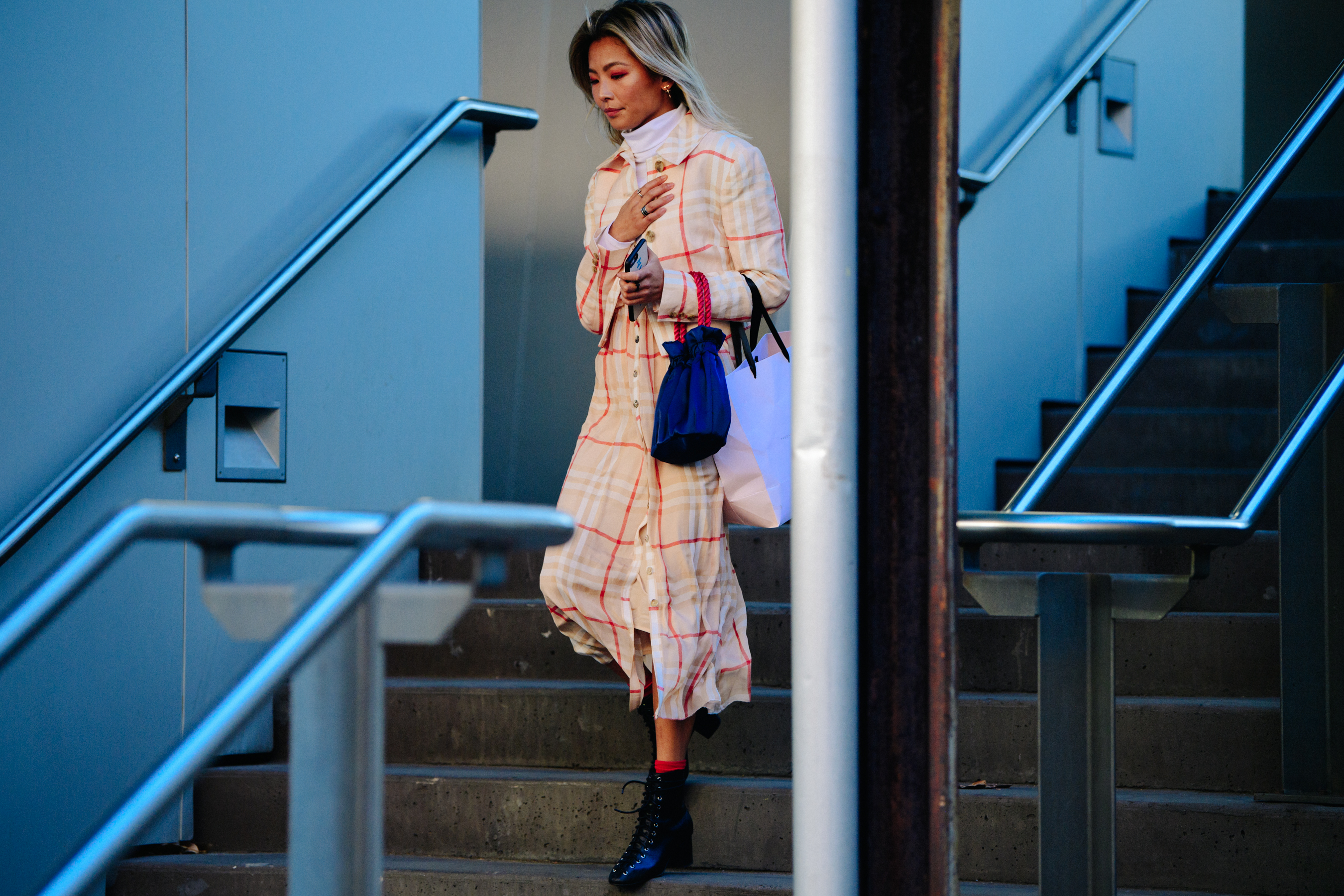Blogger wearing check dress