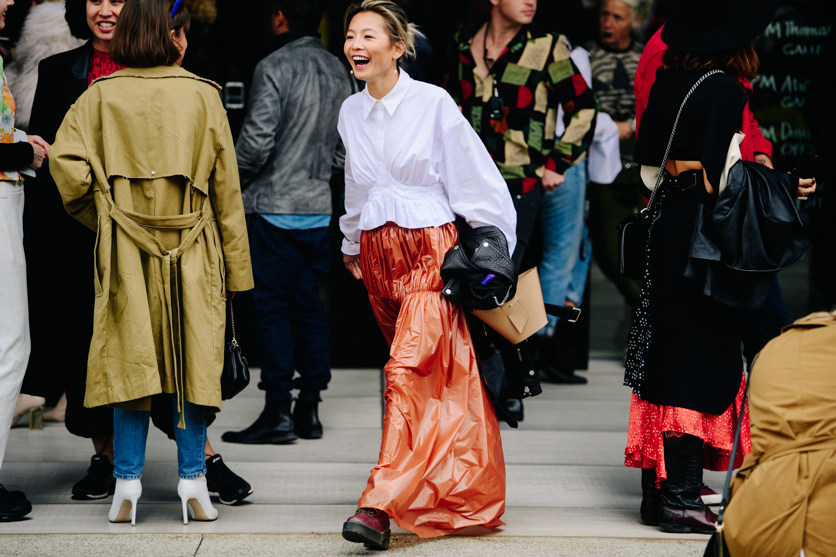 Blogger wearing white shirt