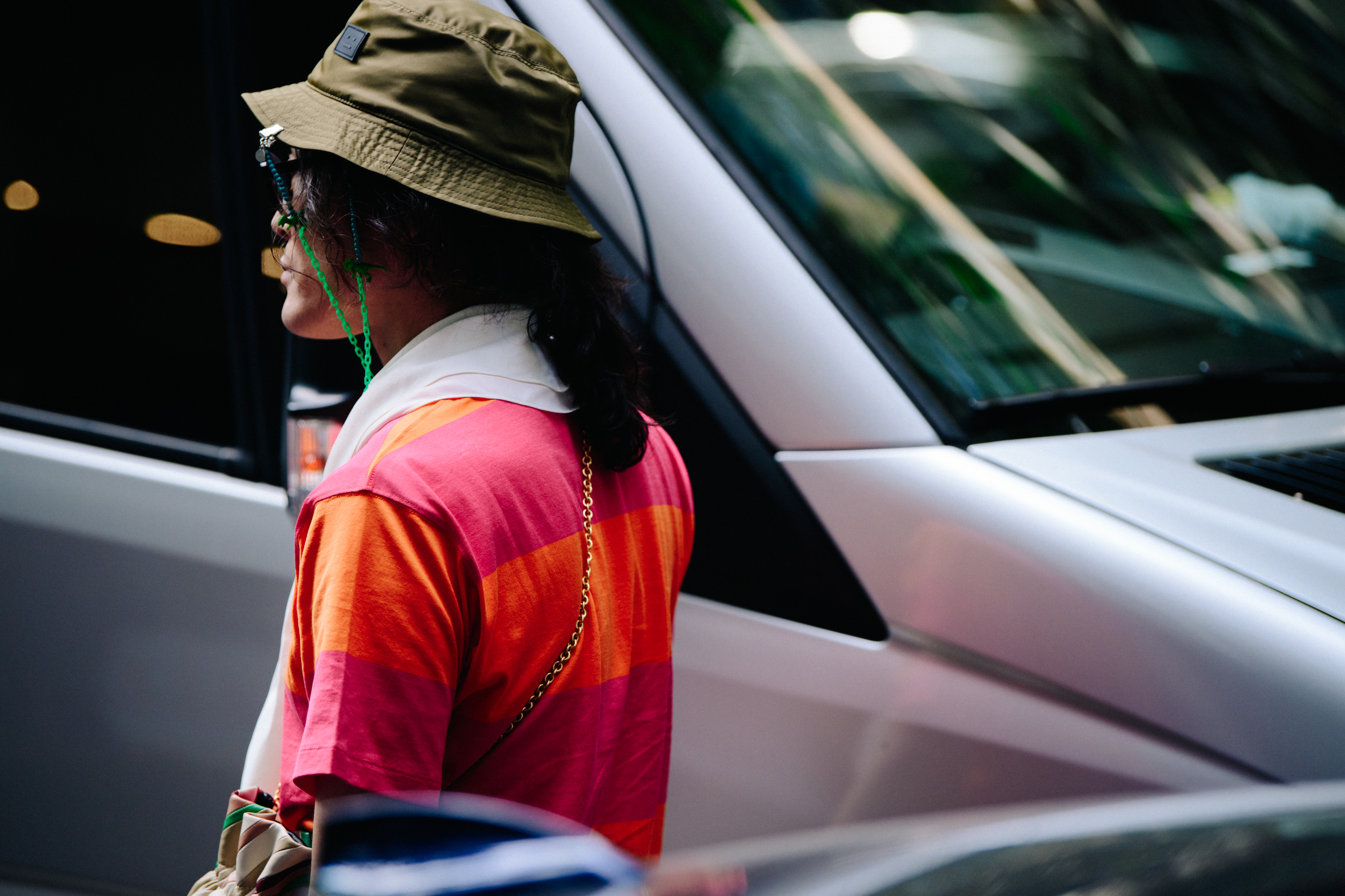 Japanese buyer wearing bucket hat