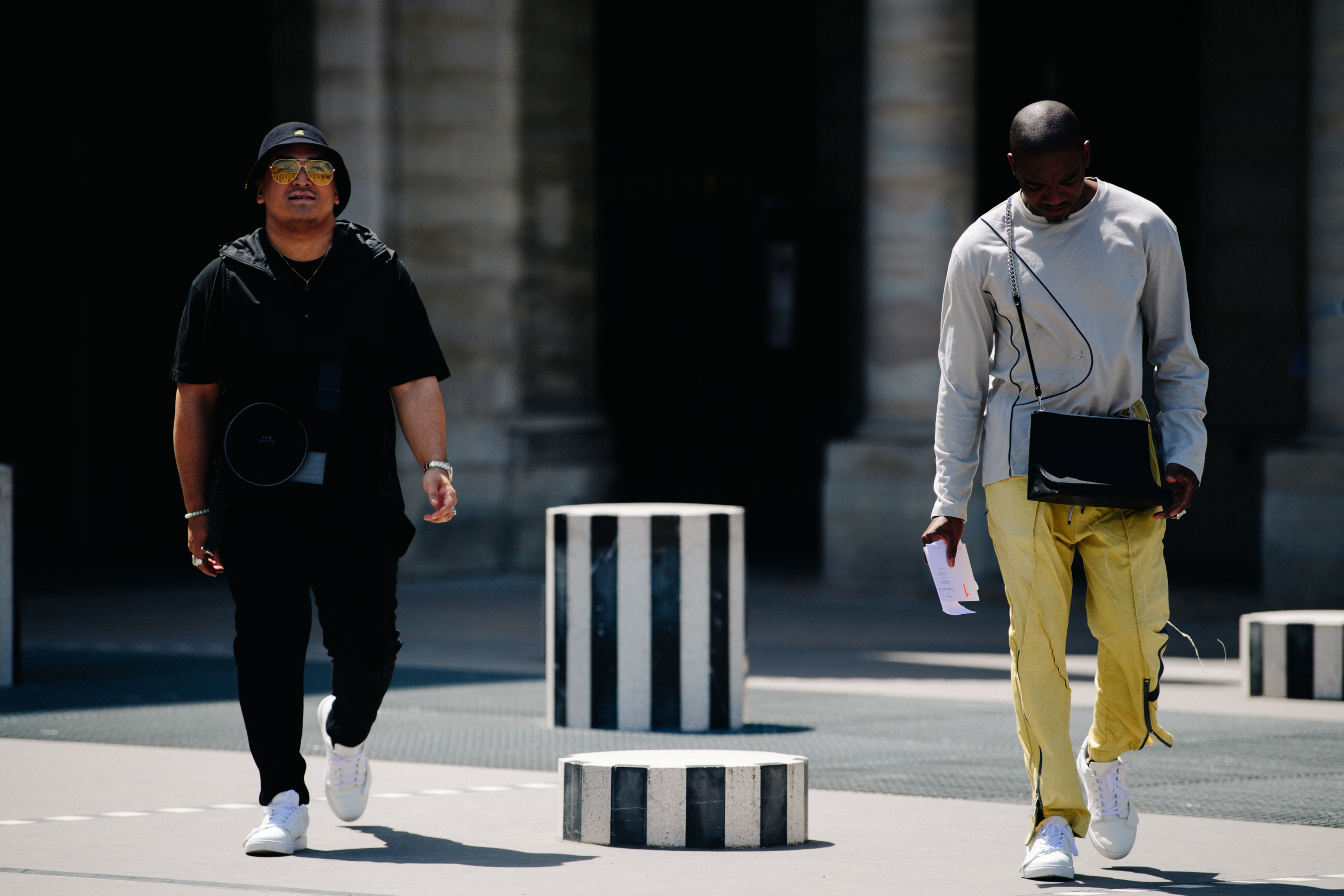 Two men wearing A Cold Wall*