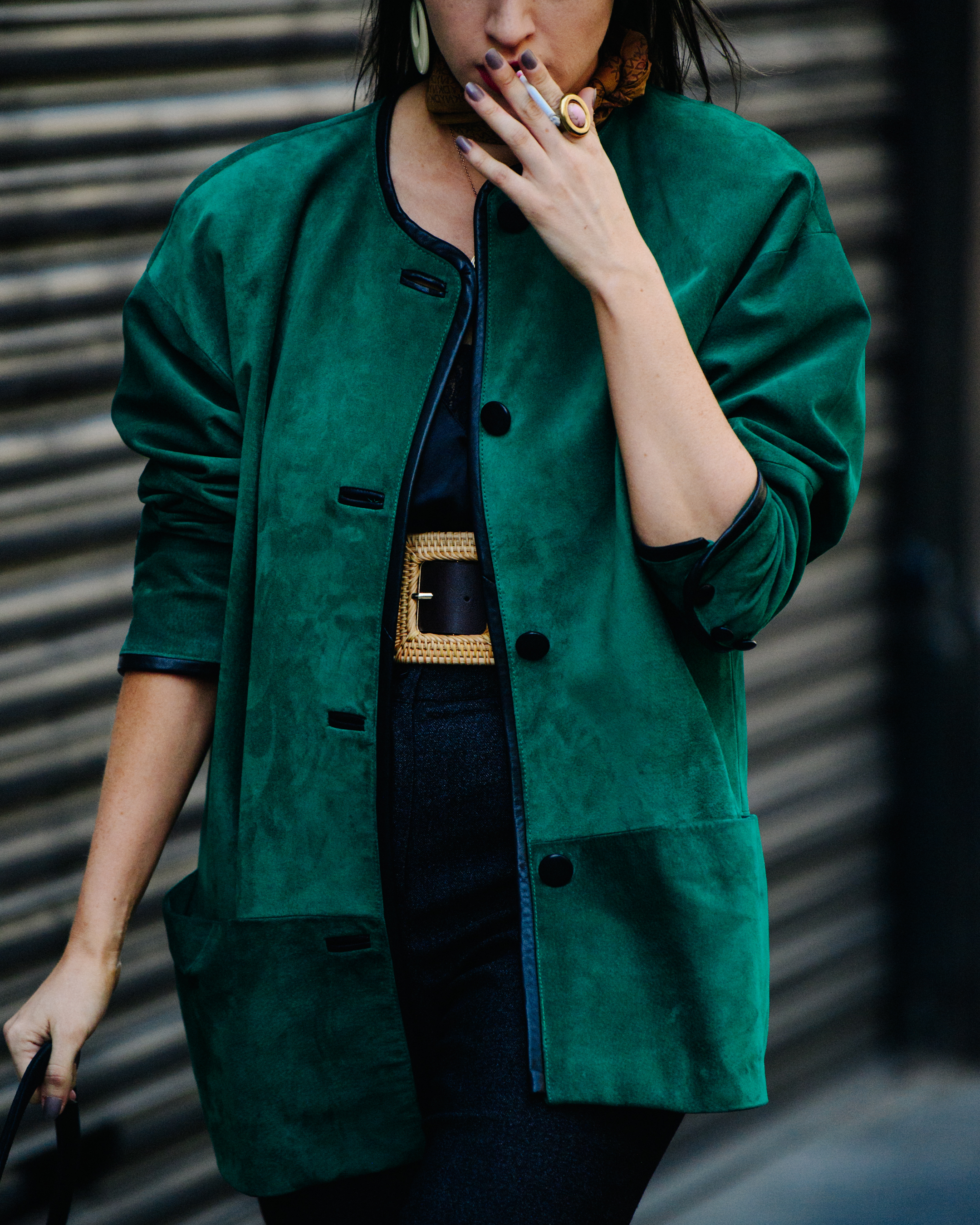 Woman wearing green jacket