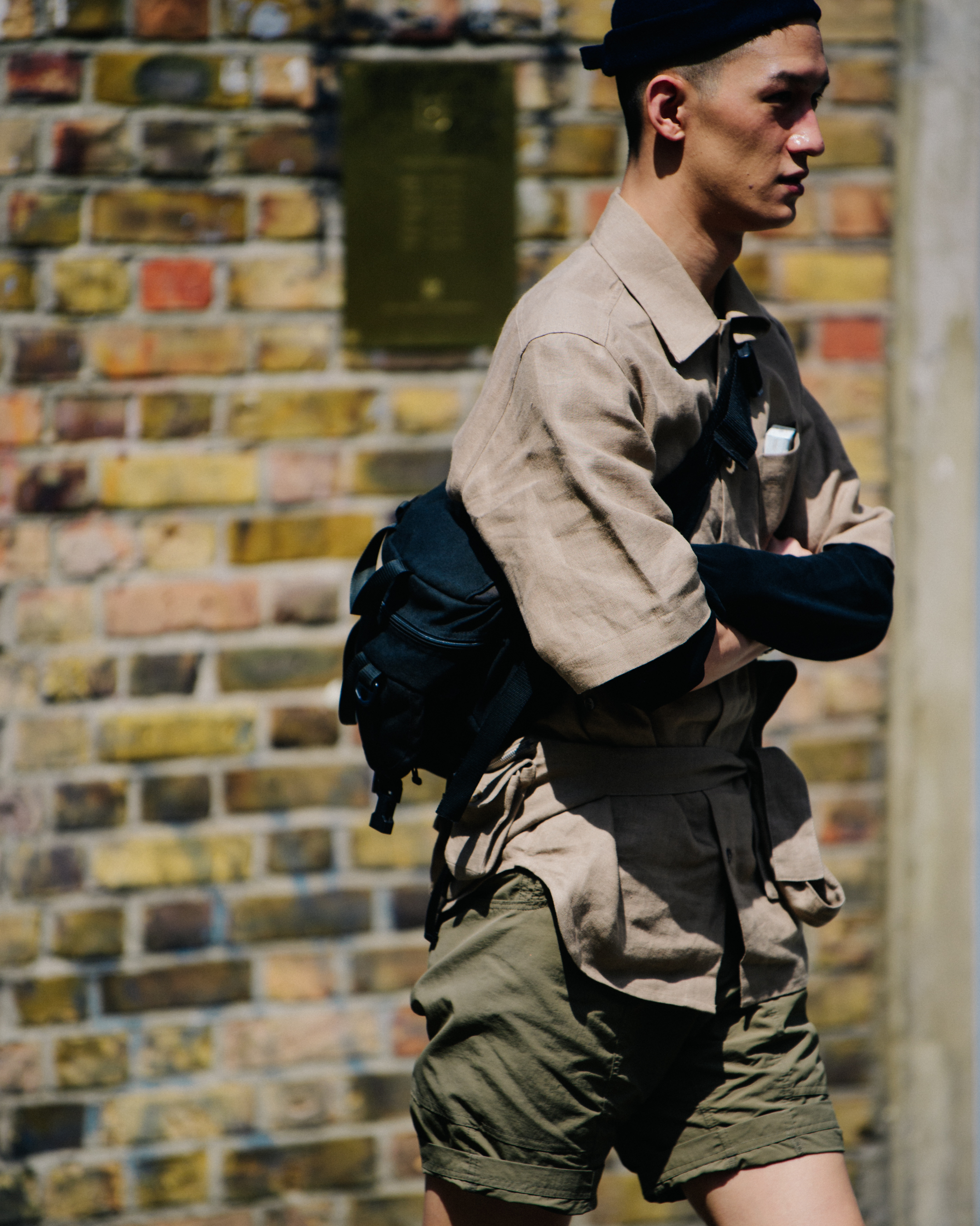 Man wearing tan outfit