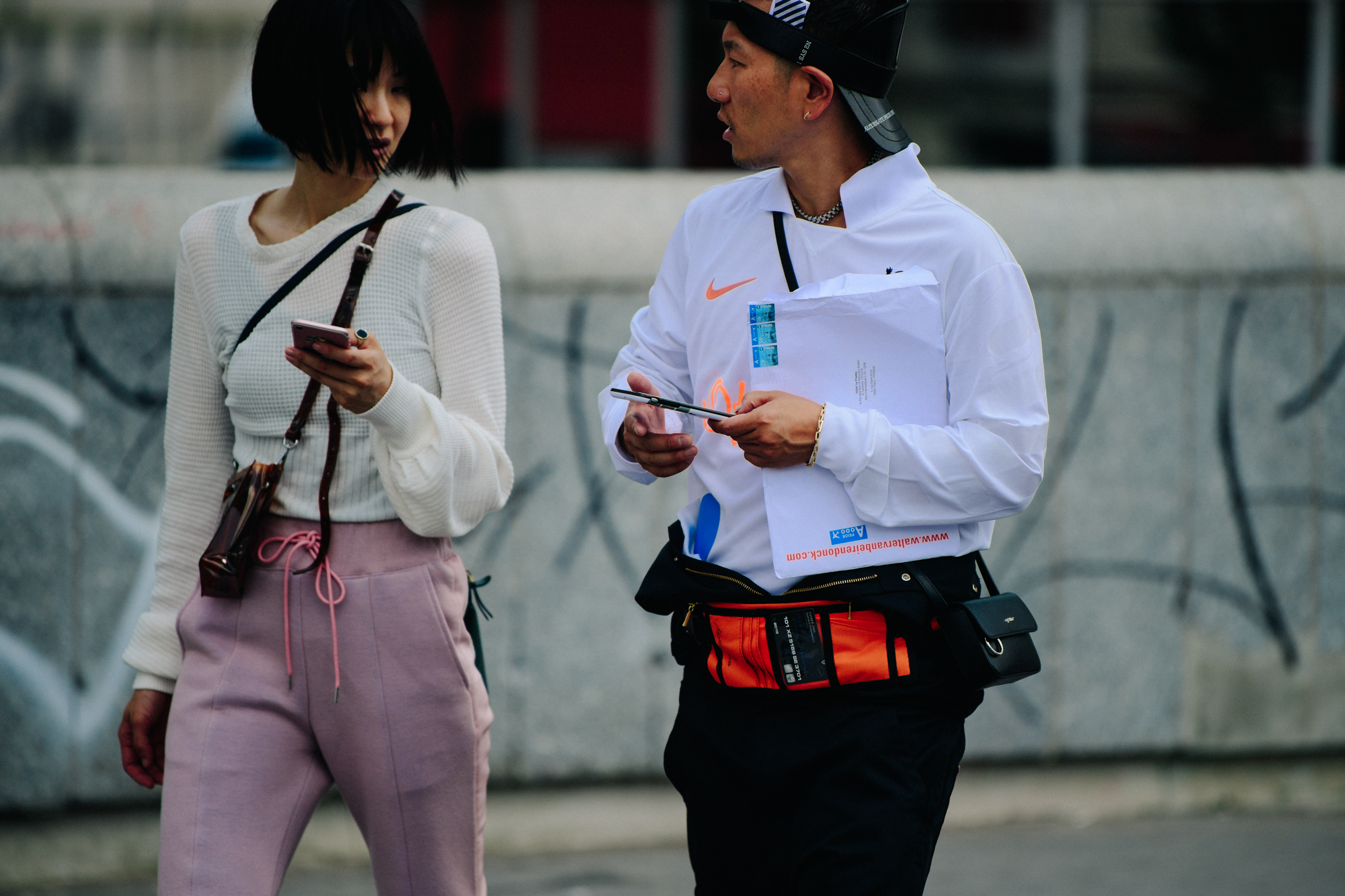 Couple wearing light outfits