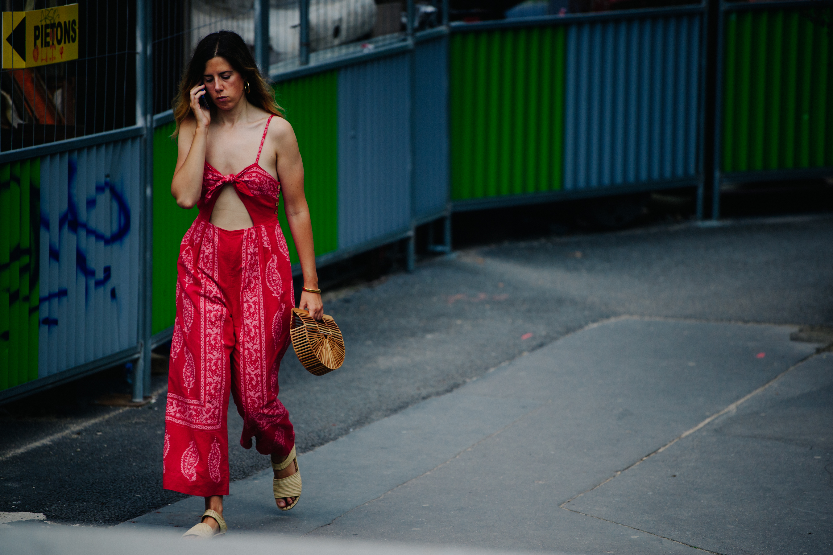 Woman wearing red jumpsuit