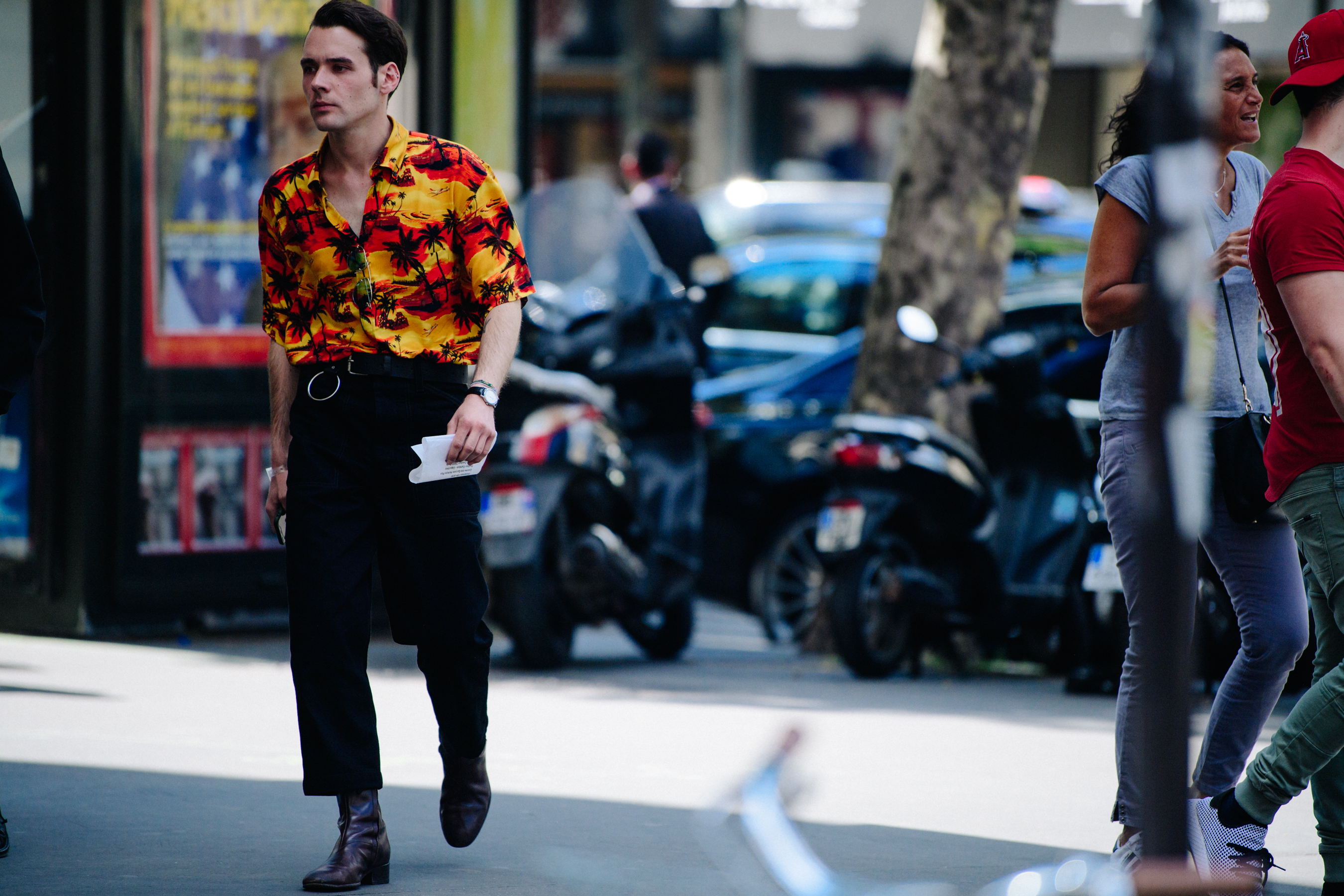 Man wearing orange shirt