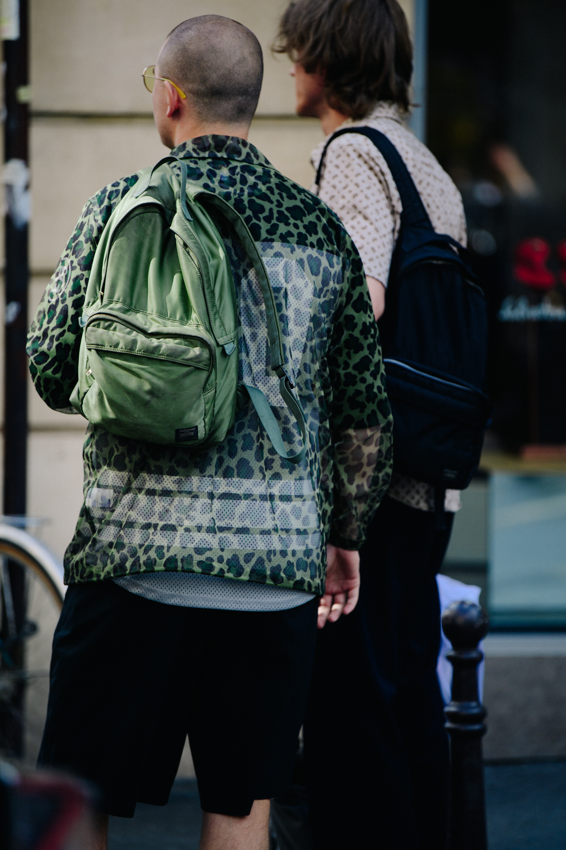 Two men carrying backpacks