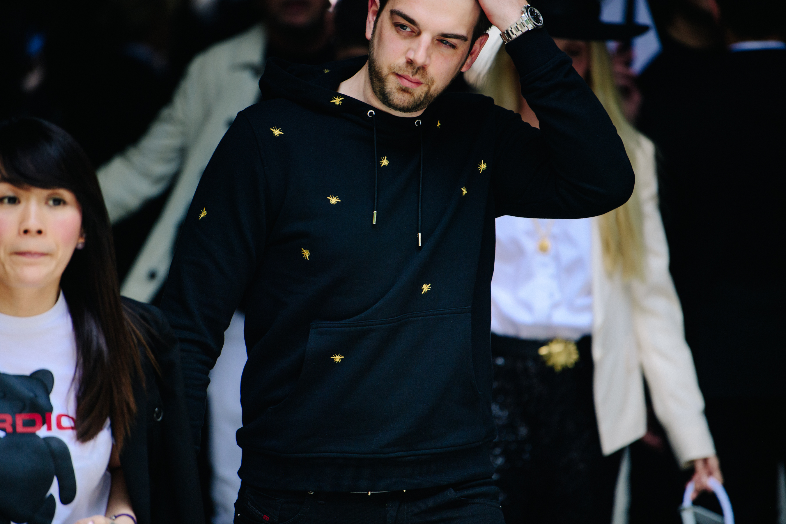 Man wearing Christian Dior hoodie