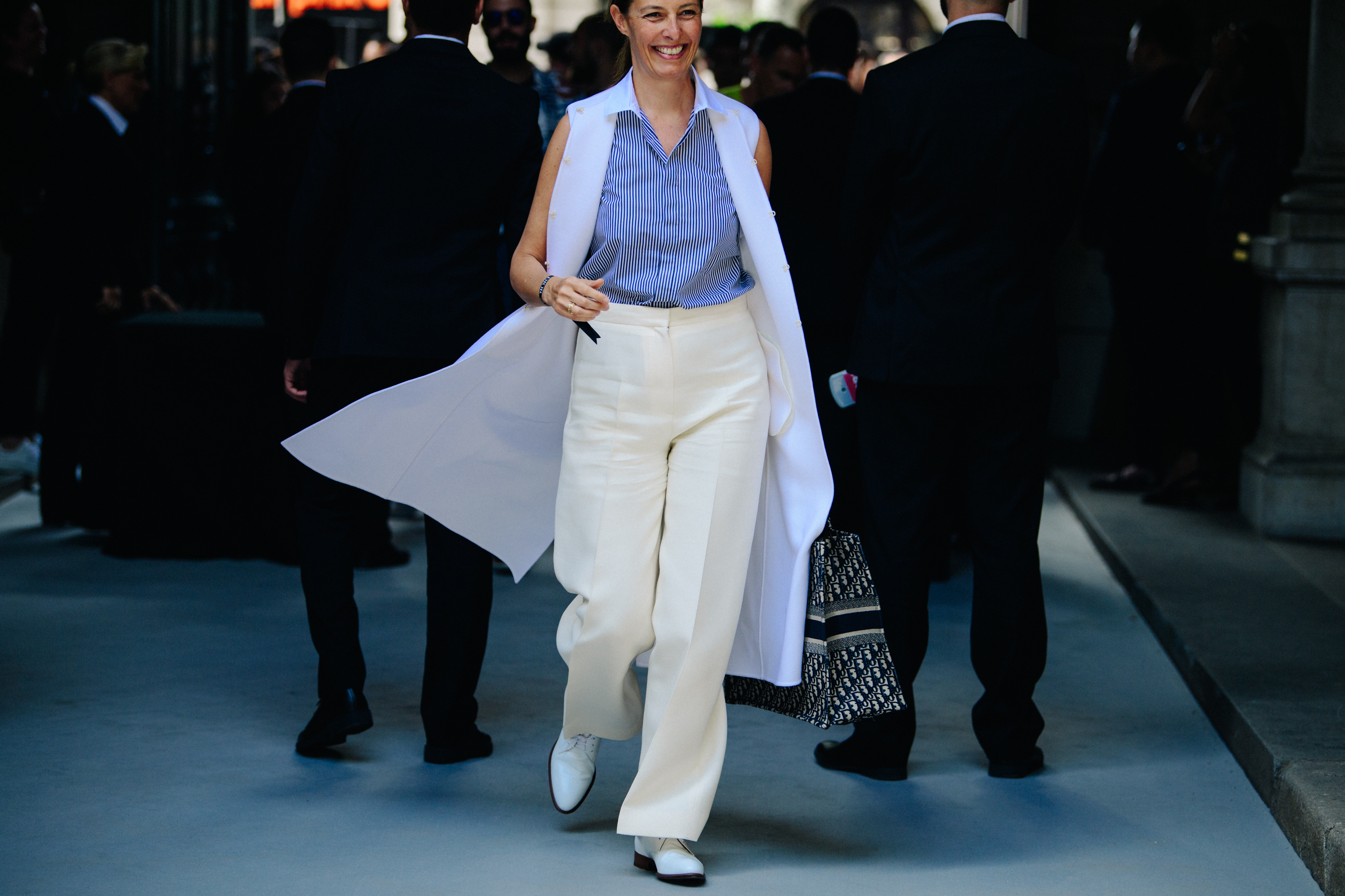 Woman wearing white coat