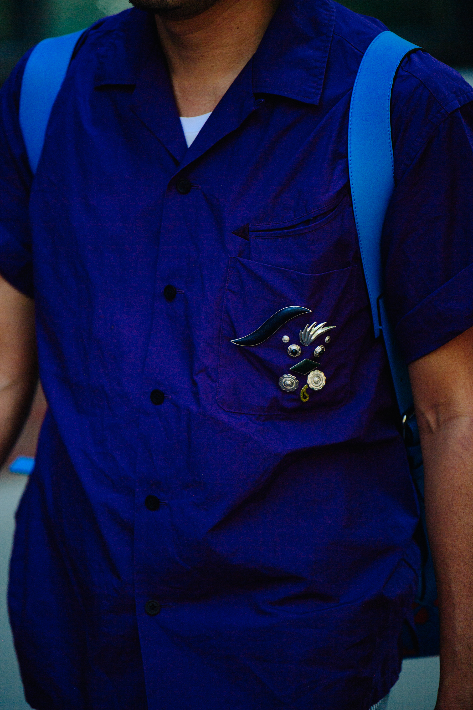 Man wearing blue shirt