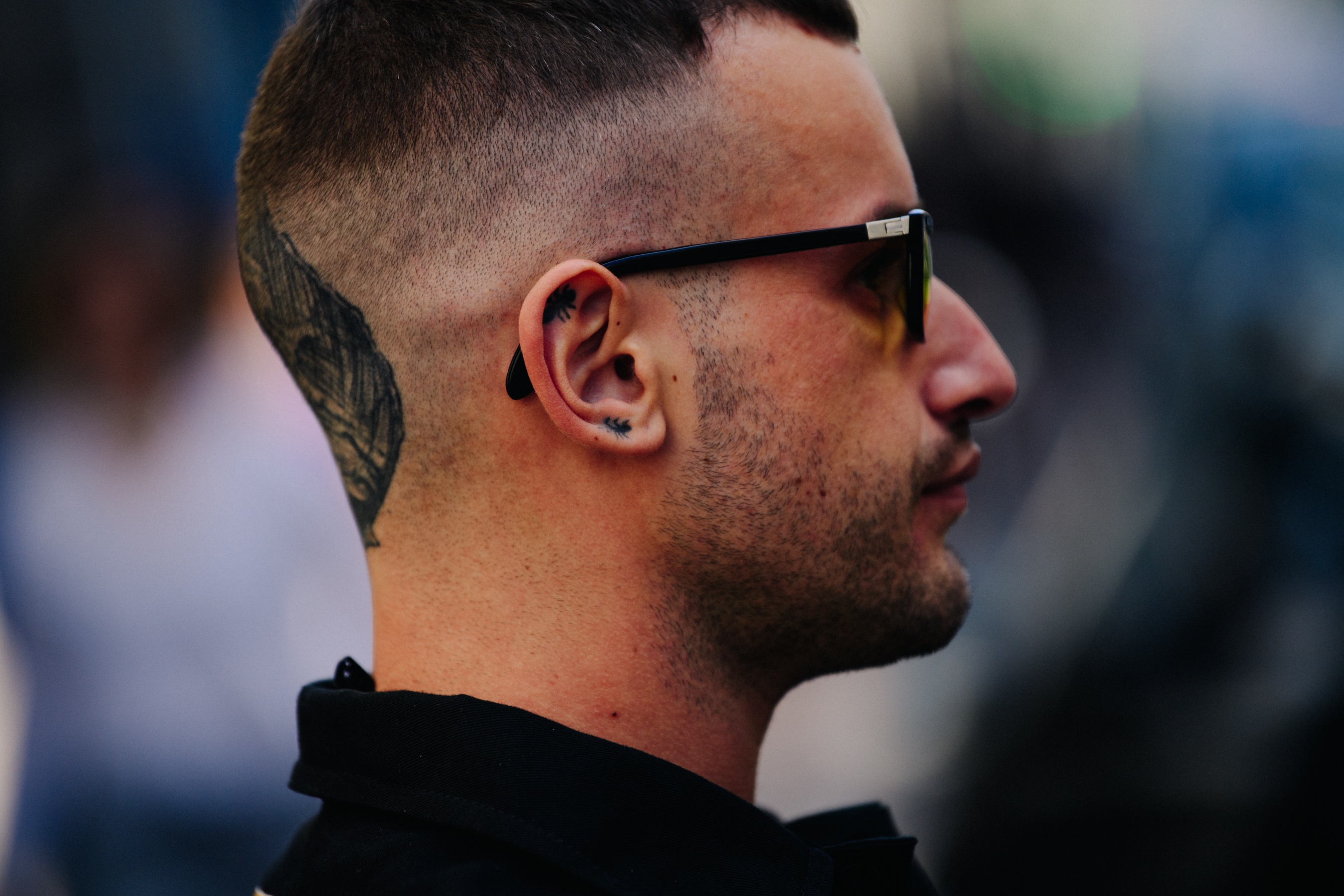 Man with head tattoo