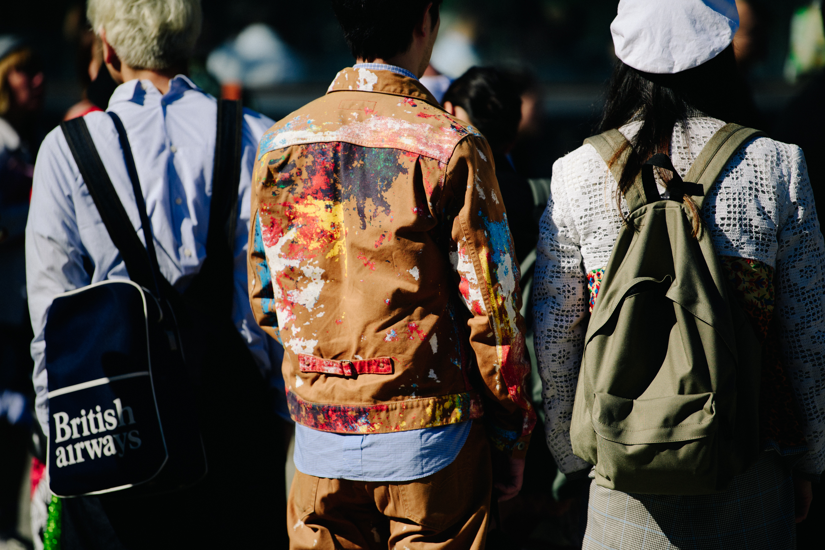 Man wearing painted jacket