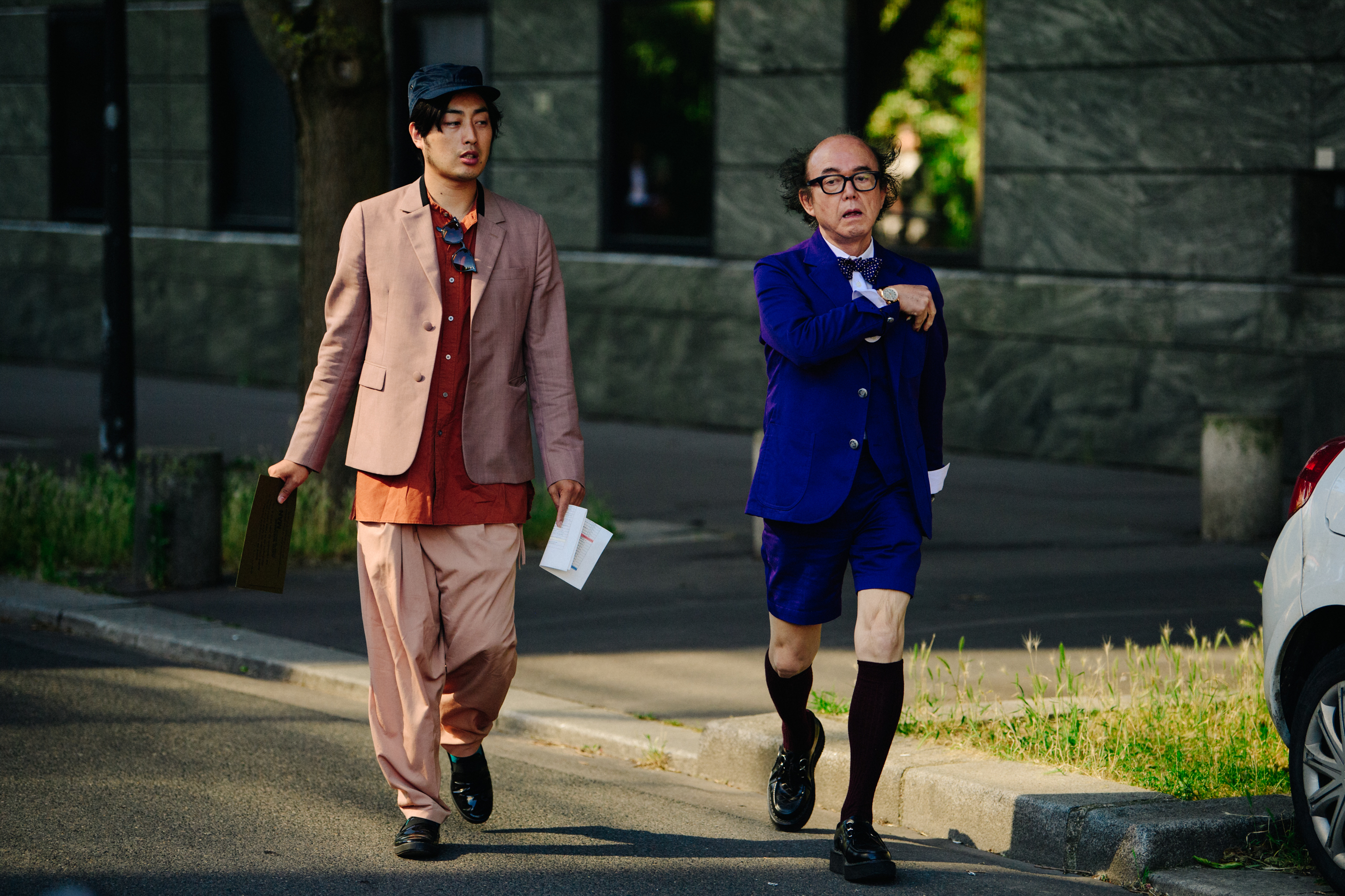 Two men wearing suits