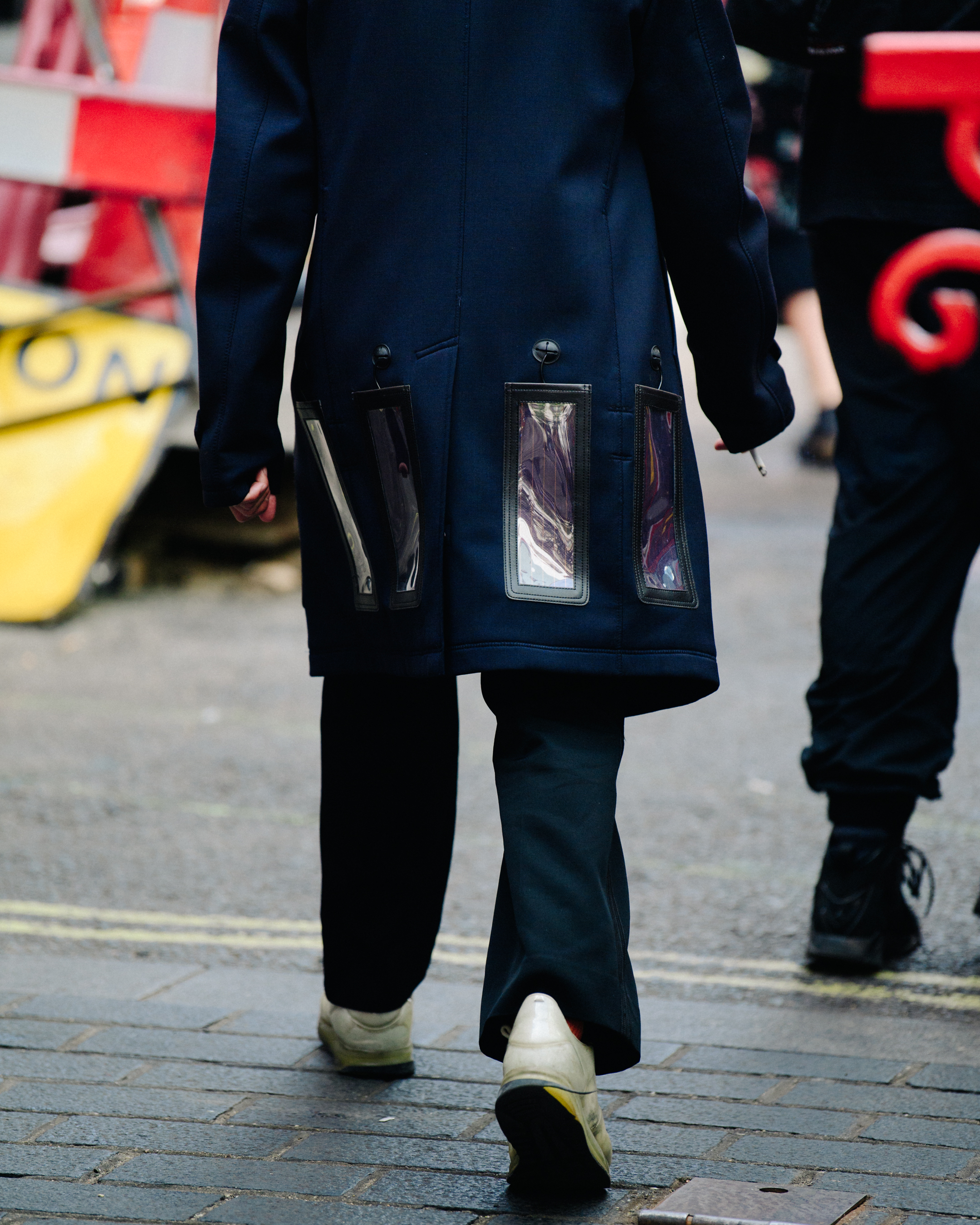 Man wearing Junya Watanabe coat