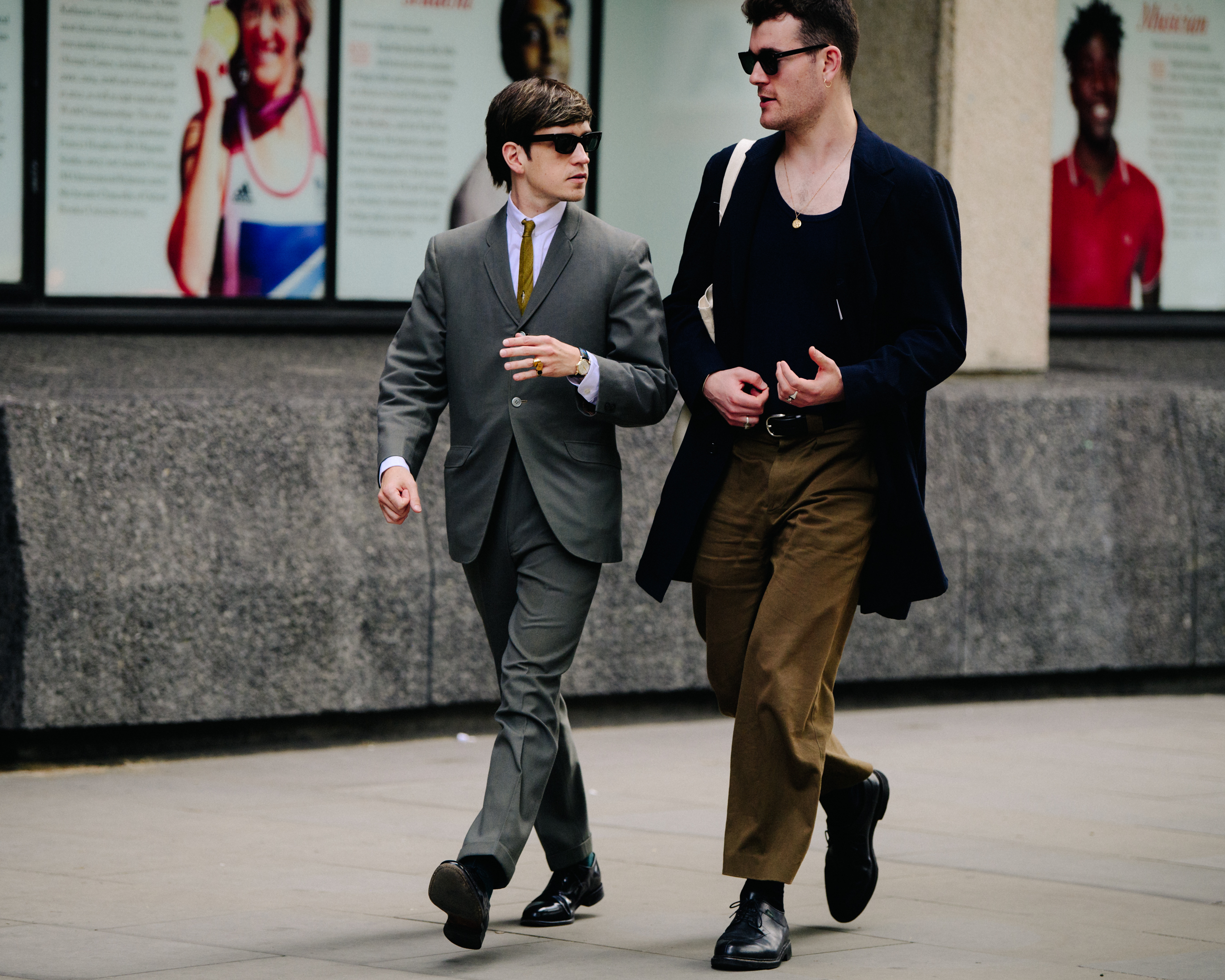 Two men wearing smart outfits