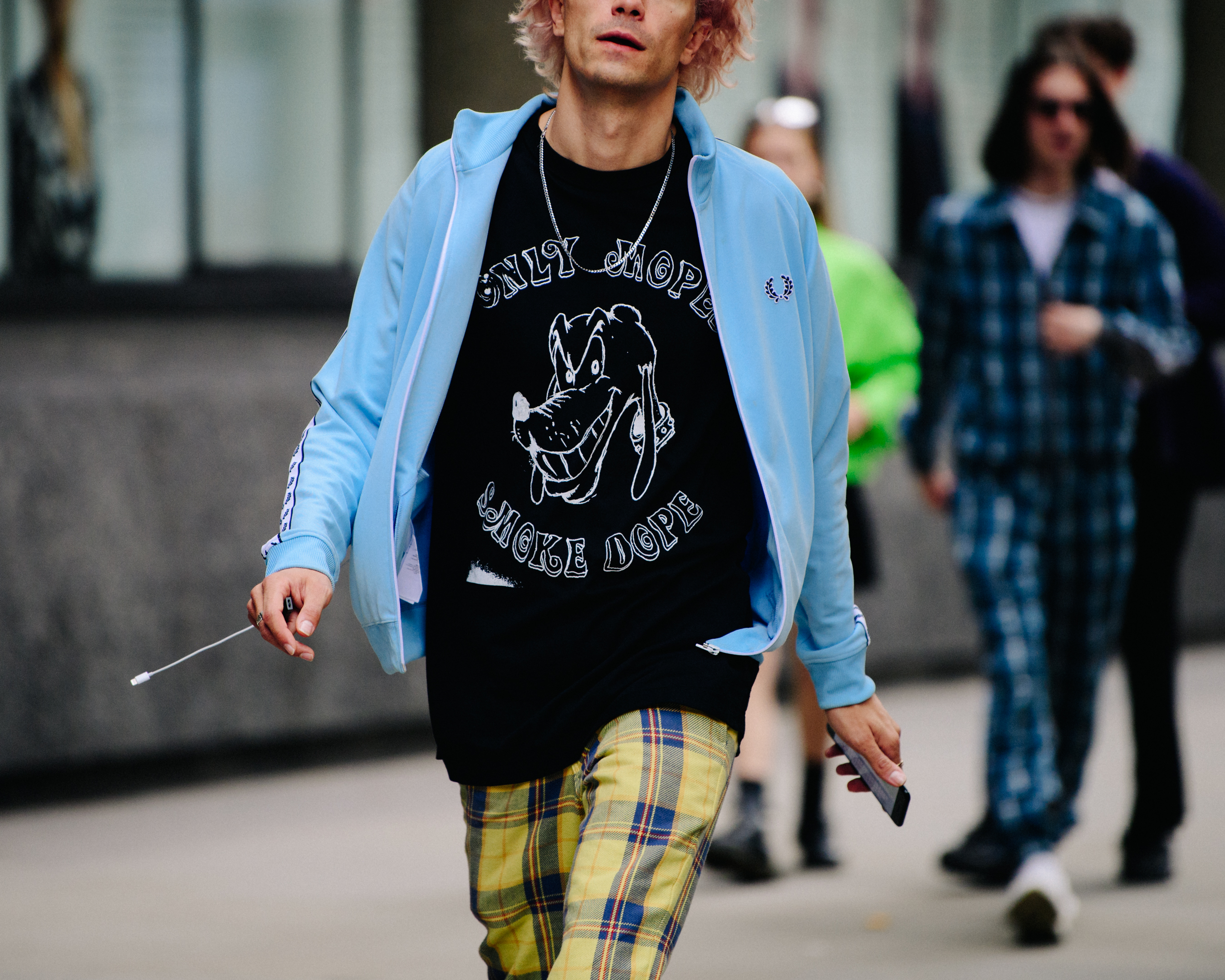 Man wearing blue sports jacket