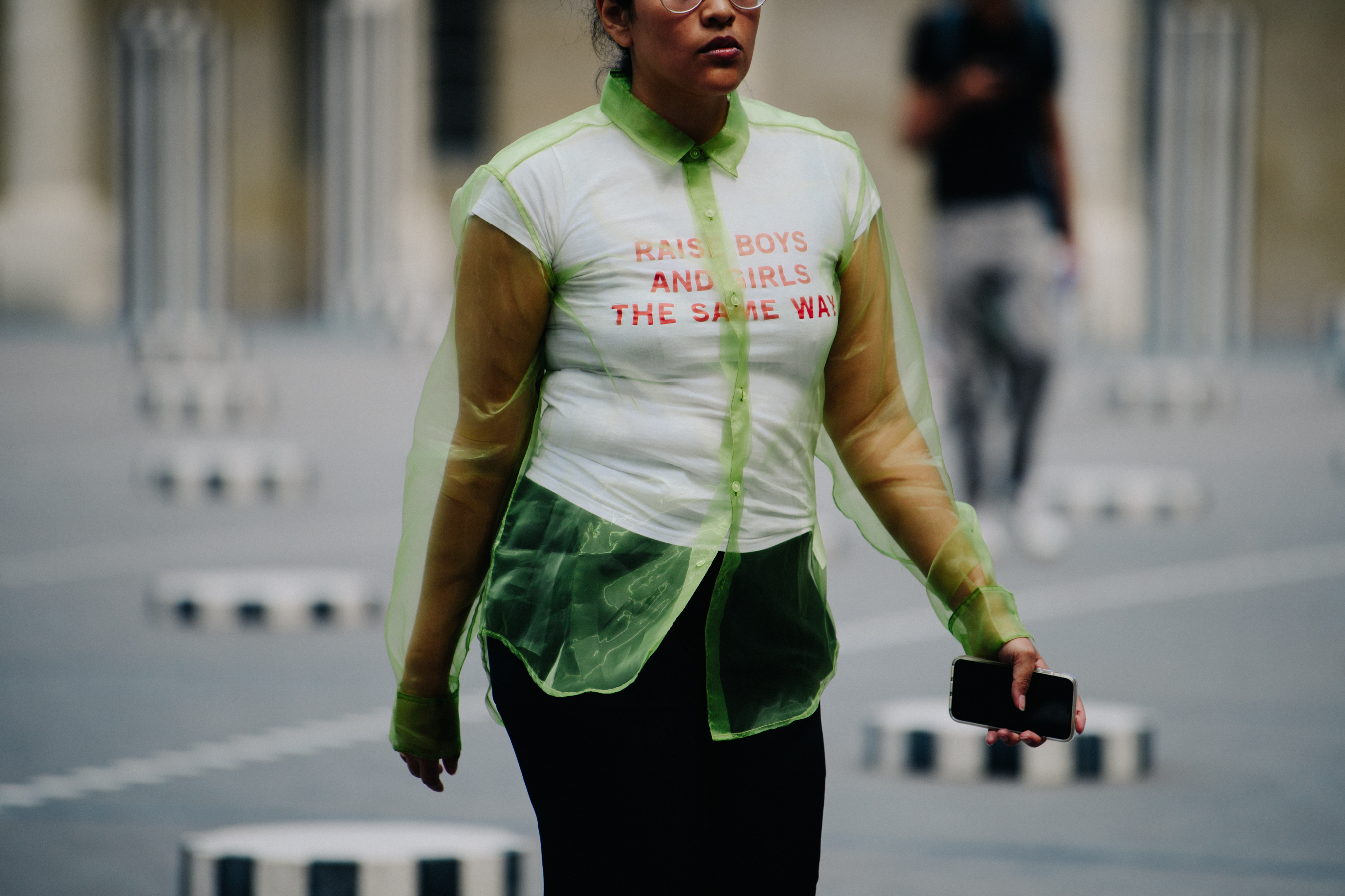 Woman wearing transparent green shirt