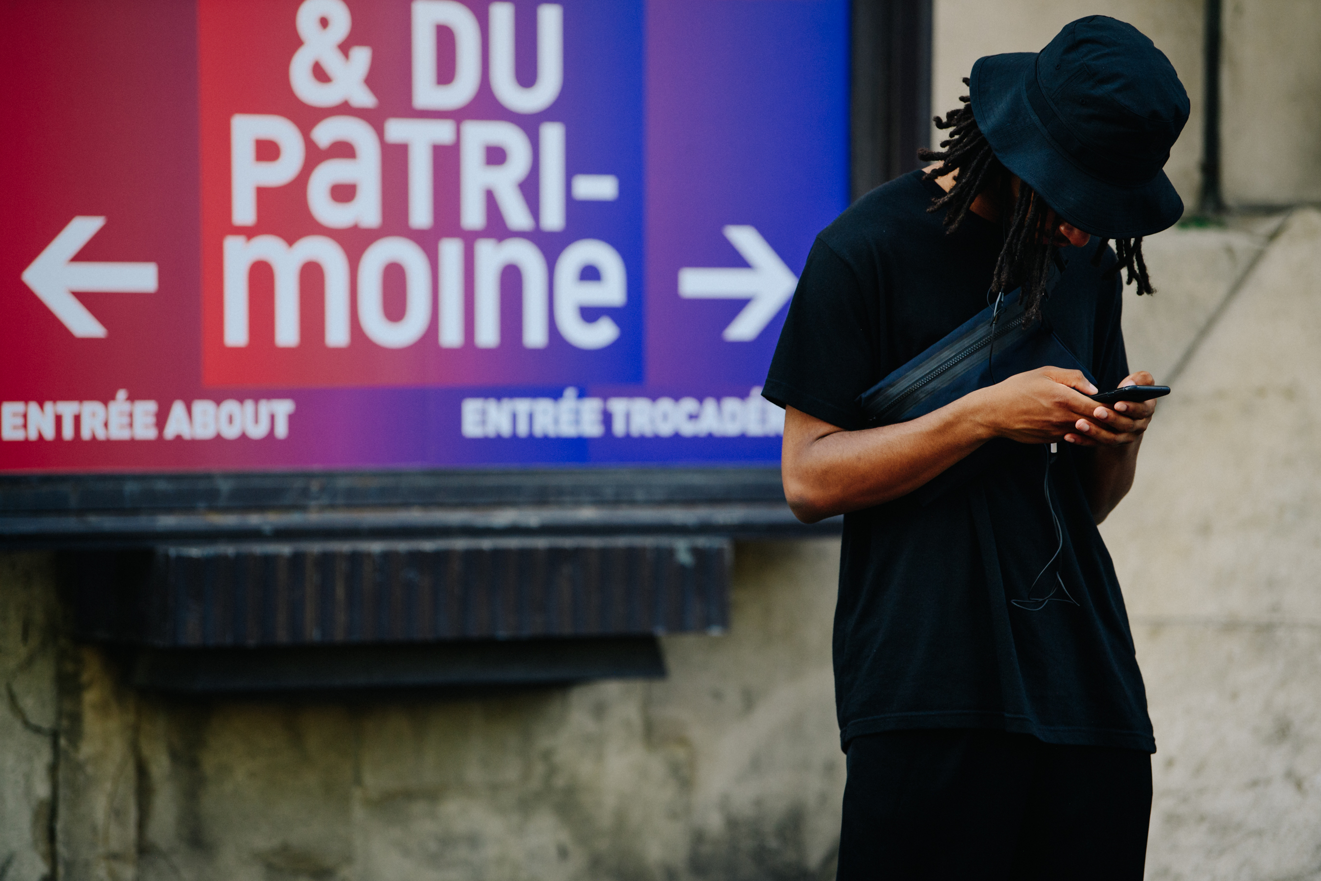 Man wearing black hat