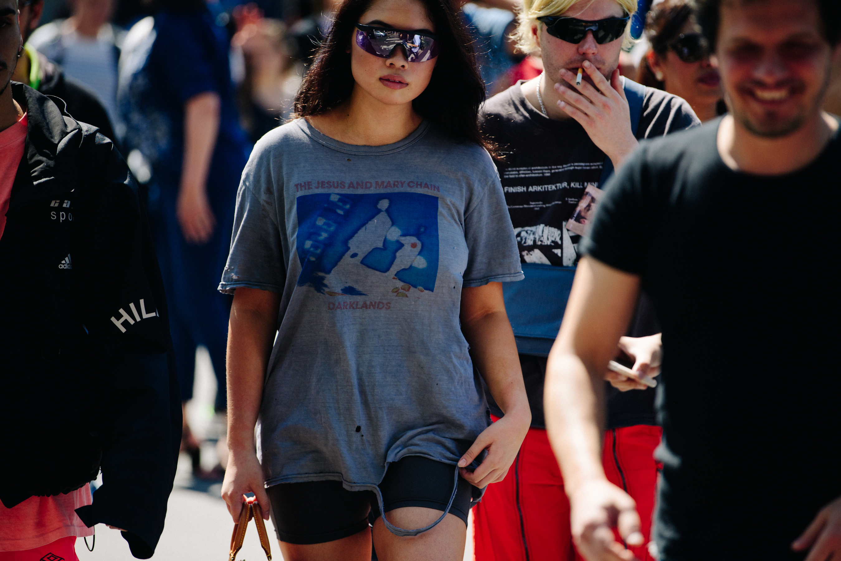 Woman wearing distressed tee shirt