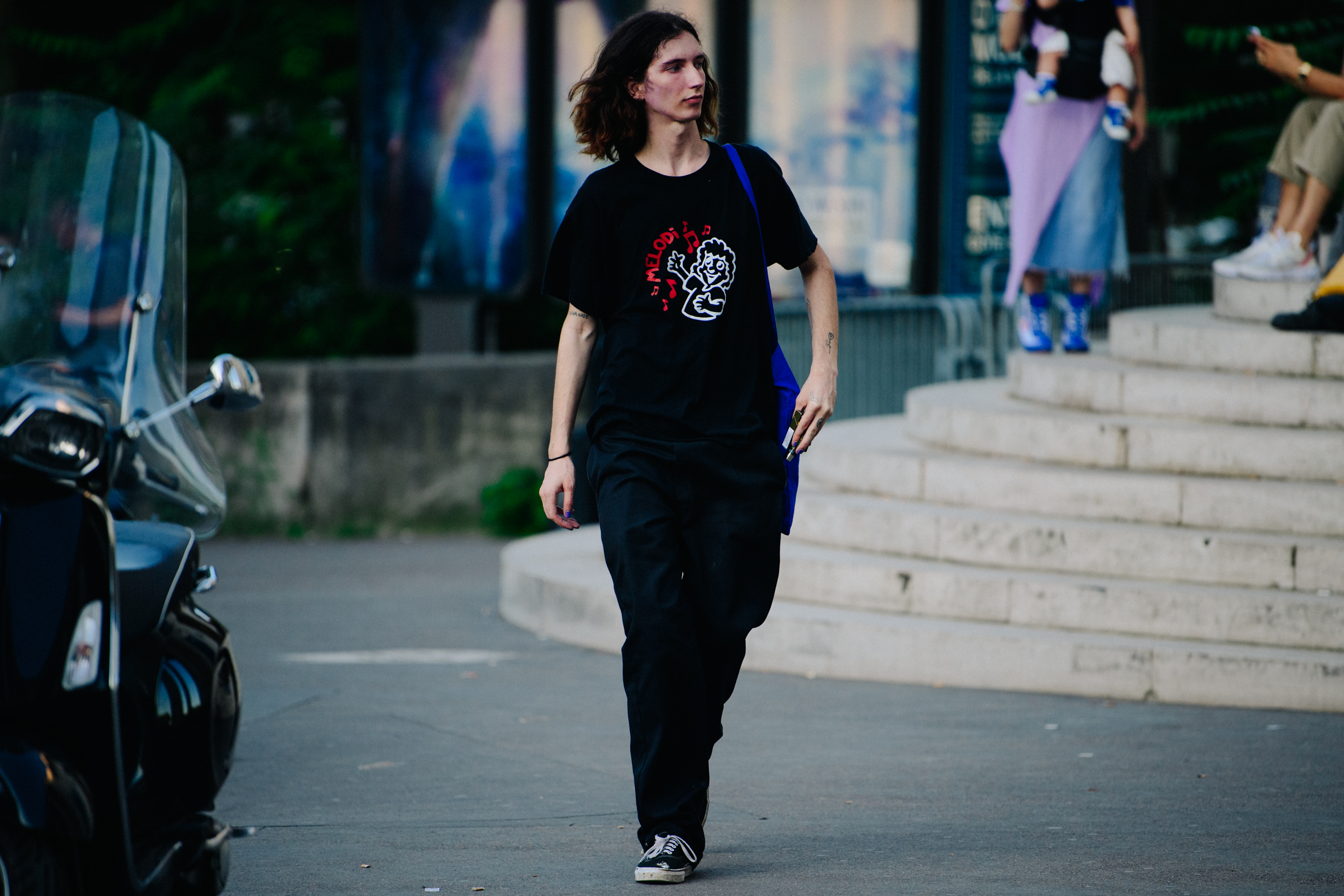 Model wearing black outfit