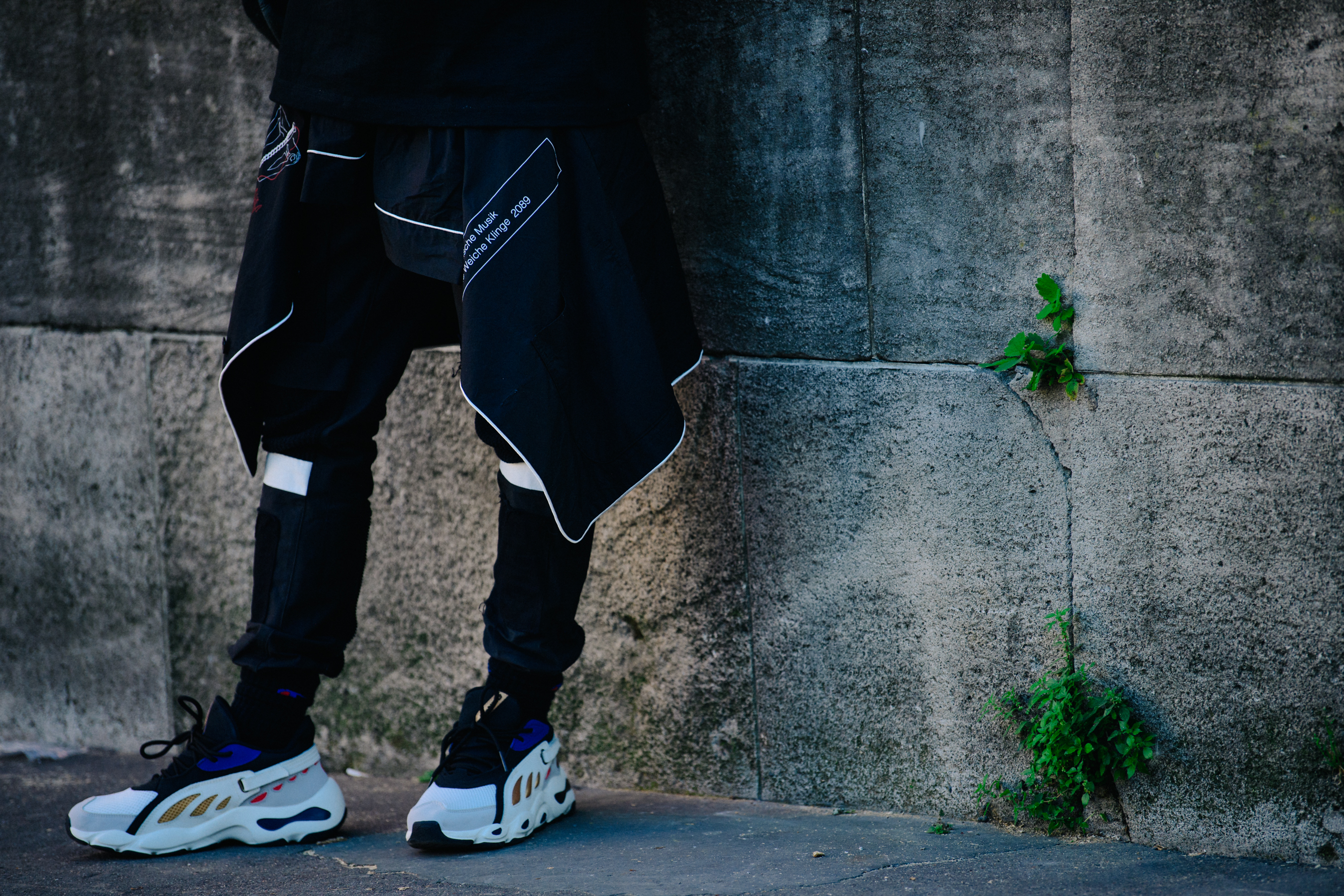 Man wearing white sneakers