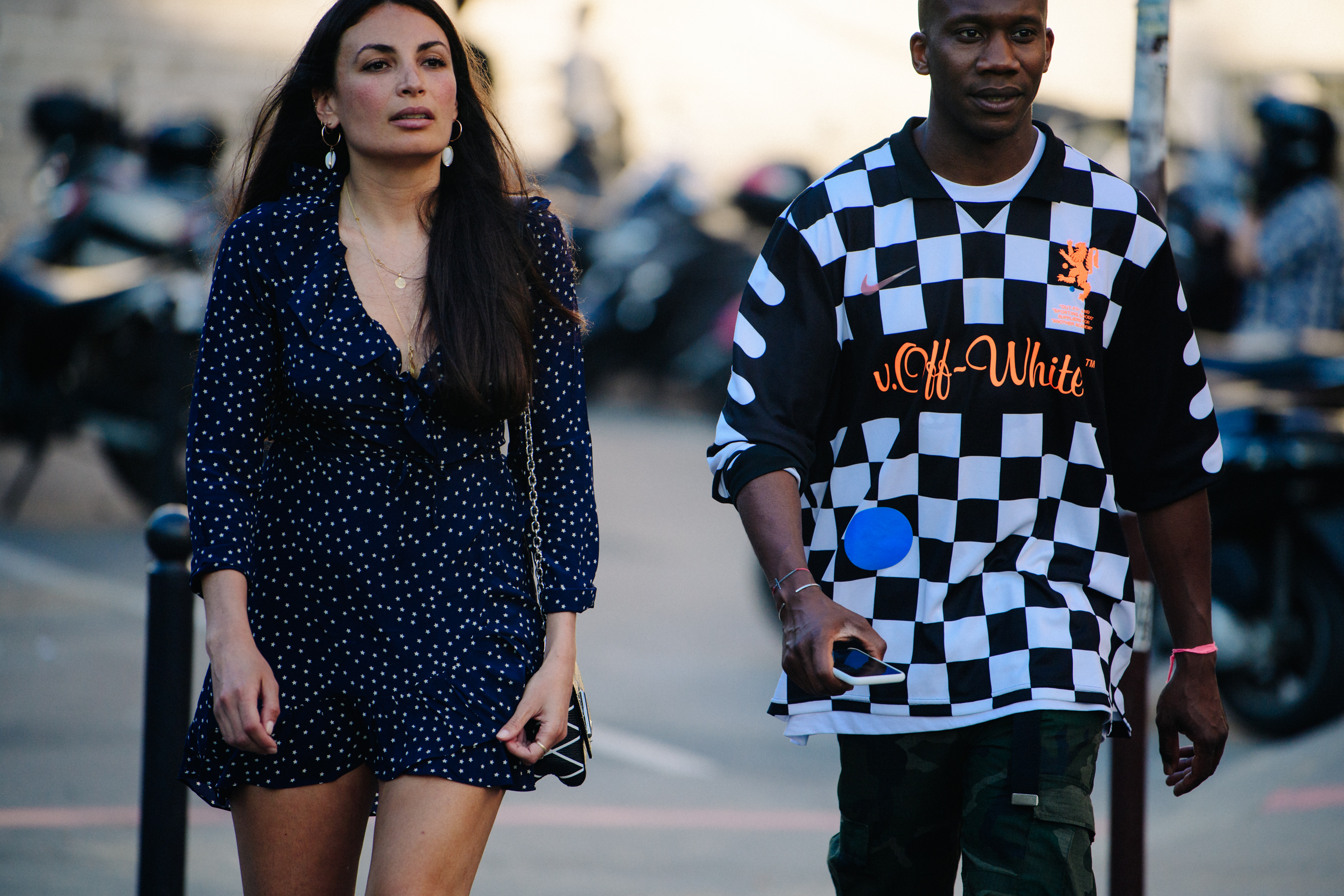 Couple wearing dark outfits