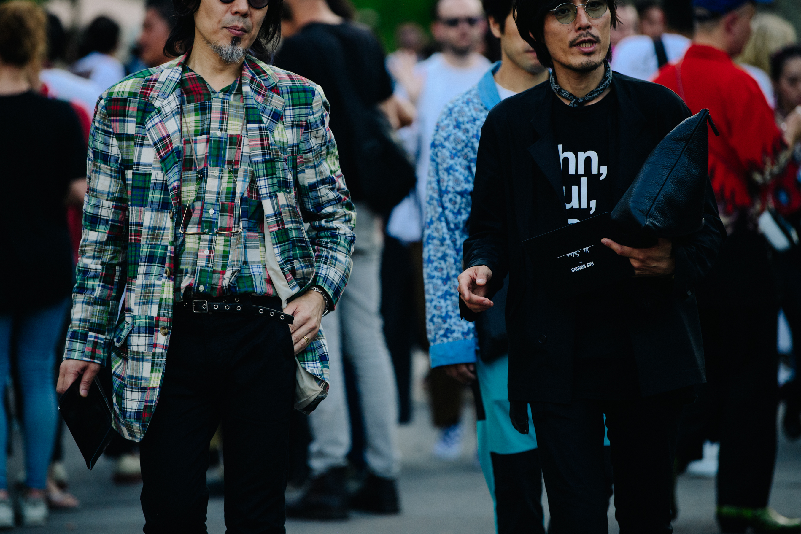 Two Asian men wearing suit jackets